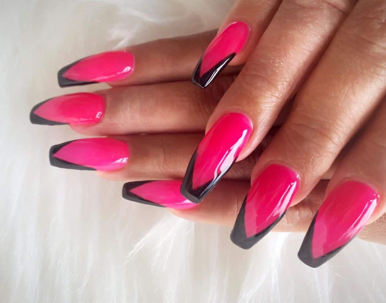 1. Sharp Pink with Black V-Tips - hot pink and black nail ideas