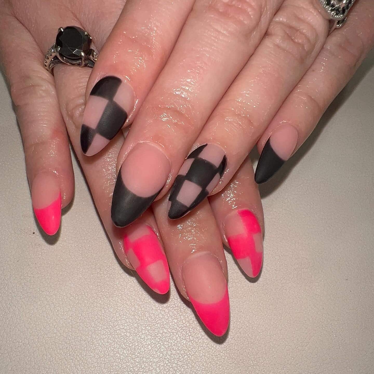 3. Checkerboard Fusion with Pink Accents - hot pink and black nail ideas