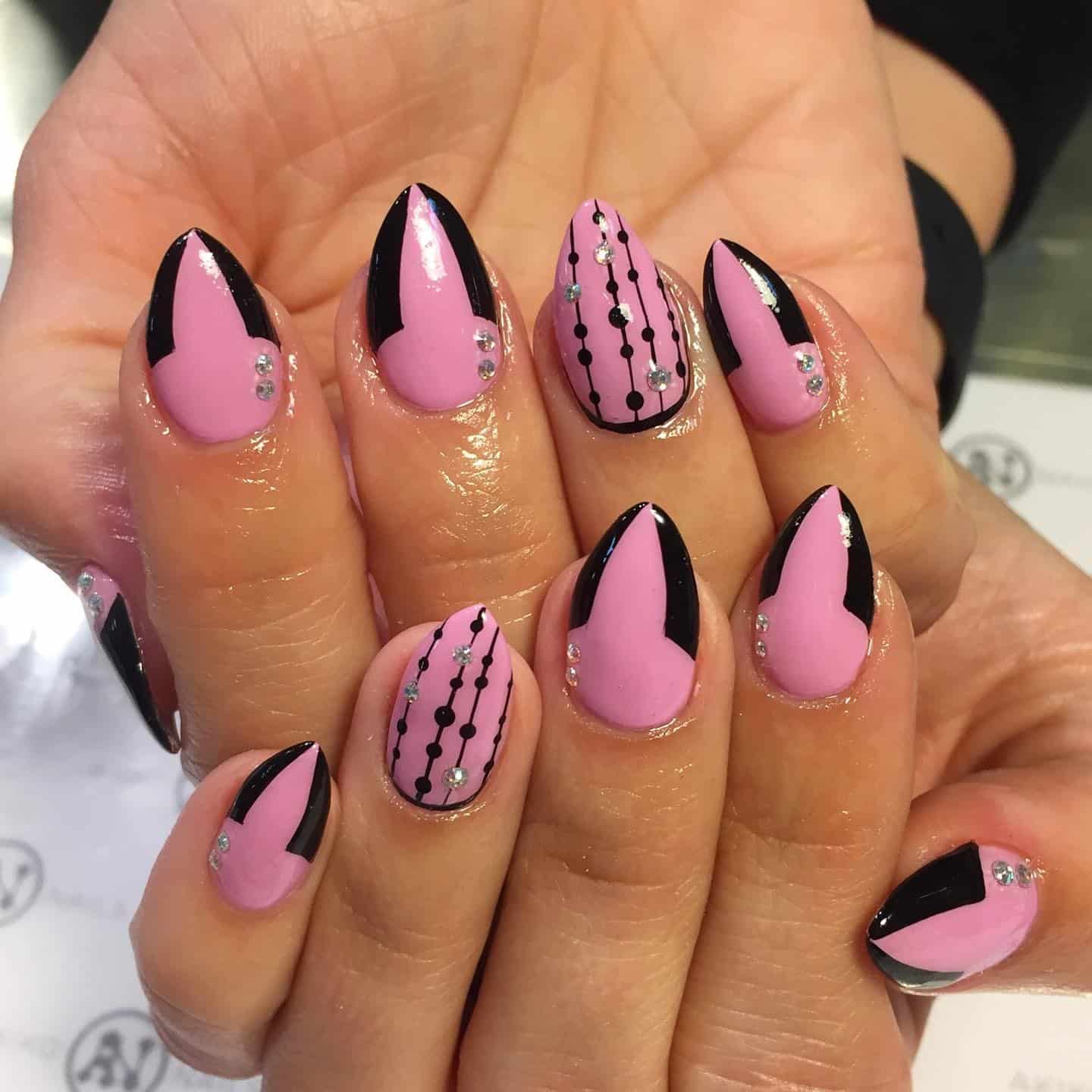 7. Soft Pink with Black Edge Art and Crystals - hot pink and black nail ideas