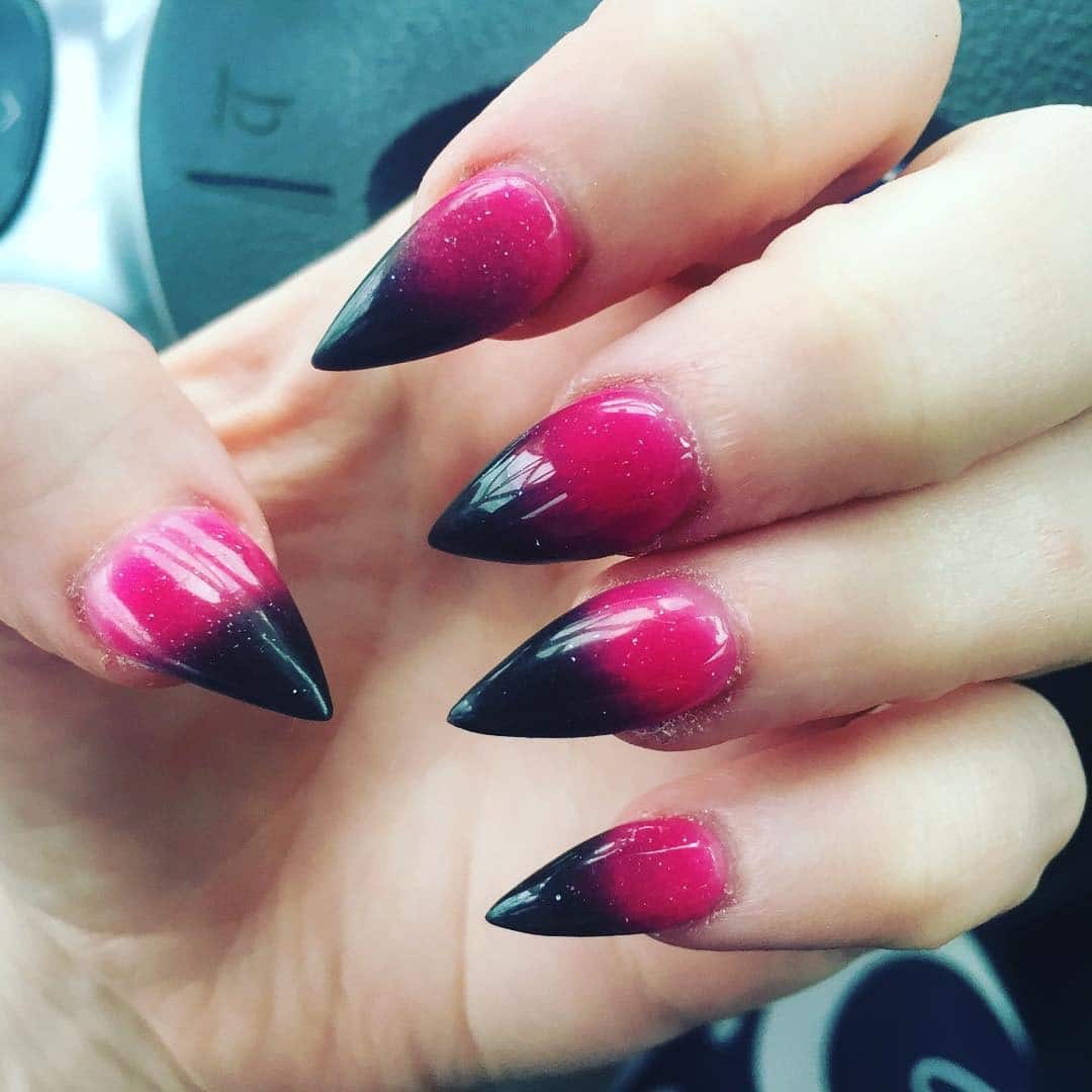 12. Stiletto Gradient Fade - hot pink and black nail ideas