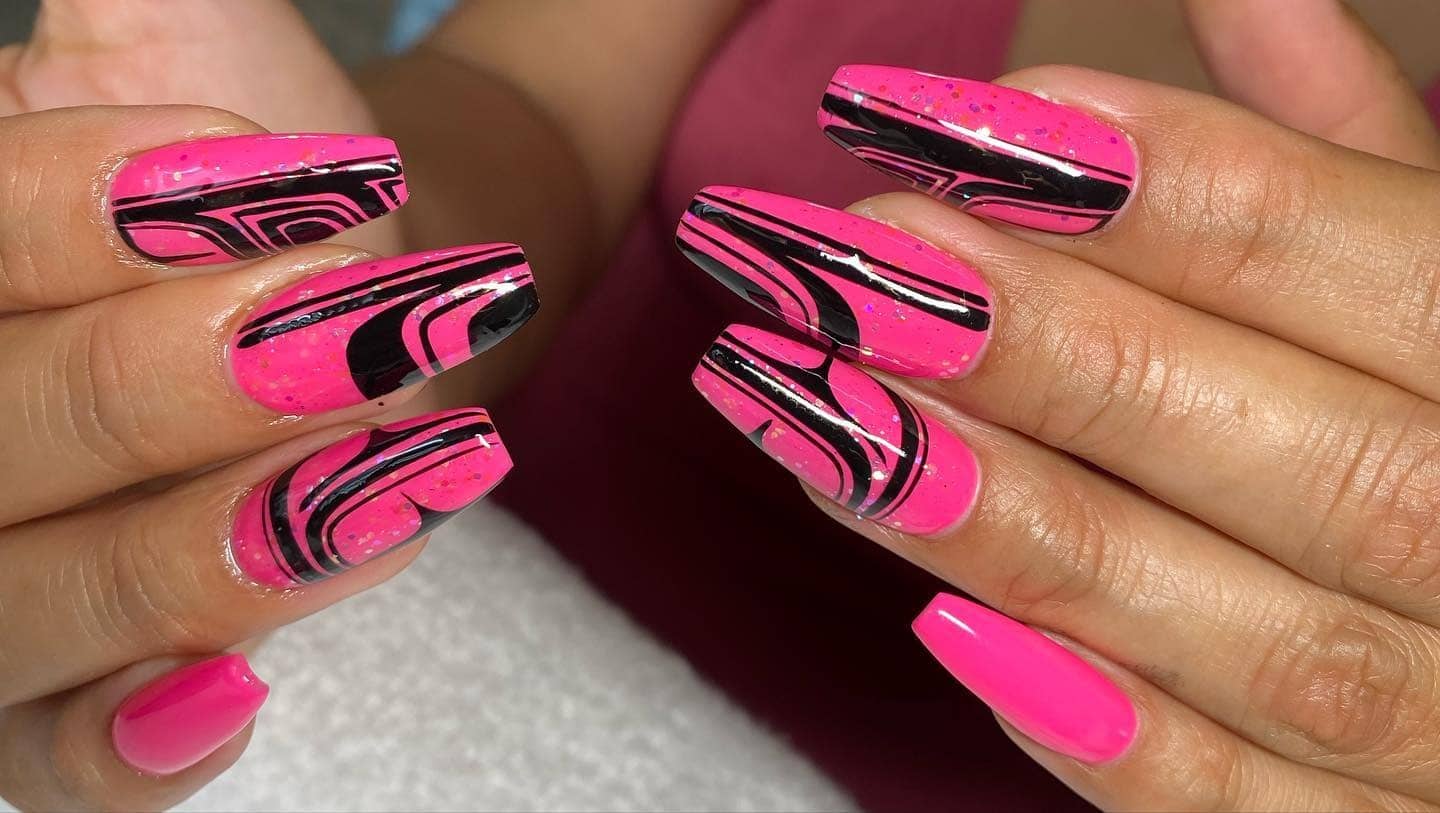 13. Electric Pink with Retro Black Swirls - hot pink and black nail ideas