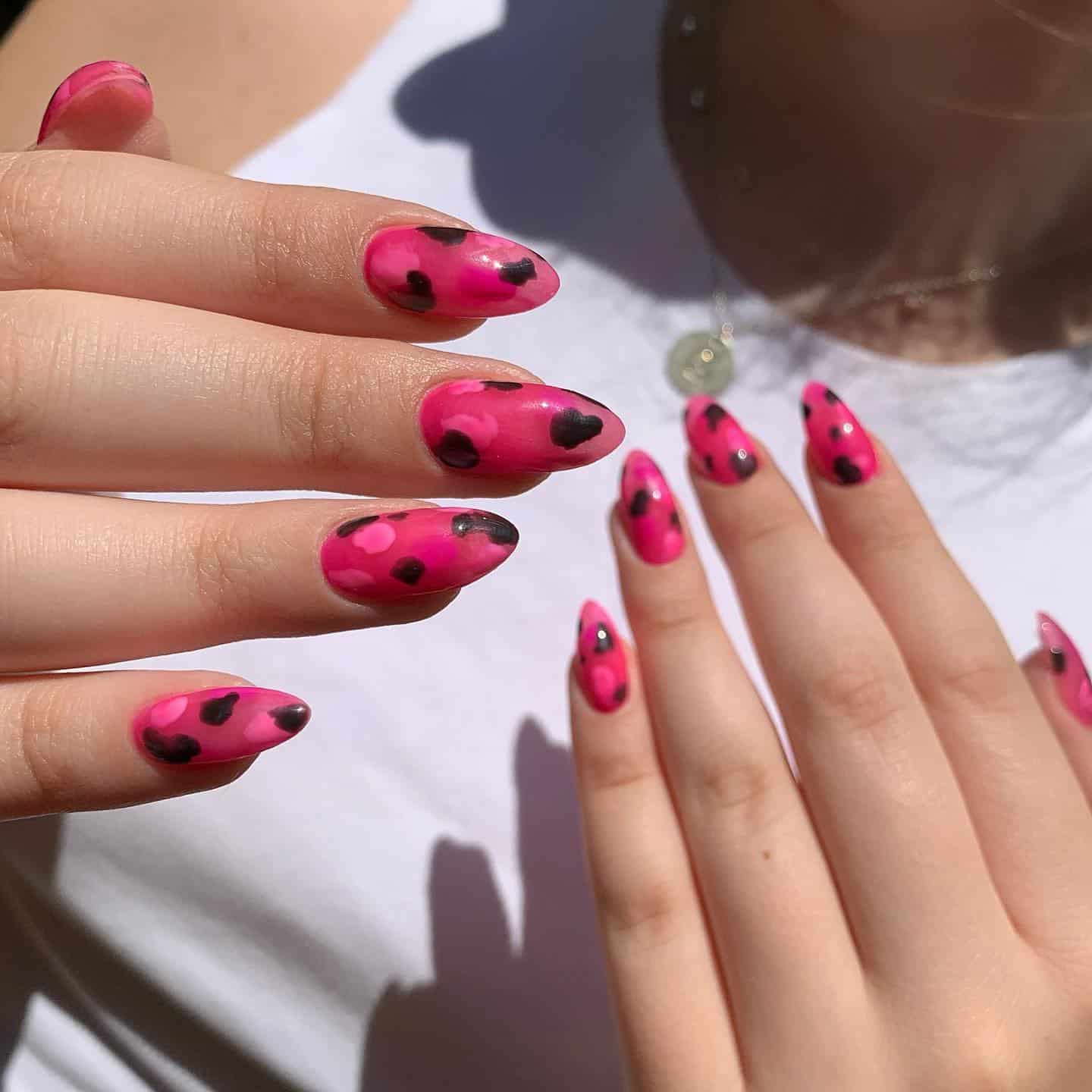 15. Abstract Pink with Black Spots - hot pink and black nail ideas
