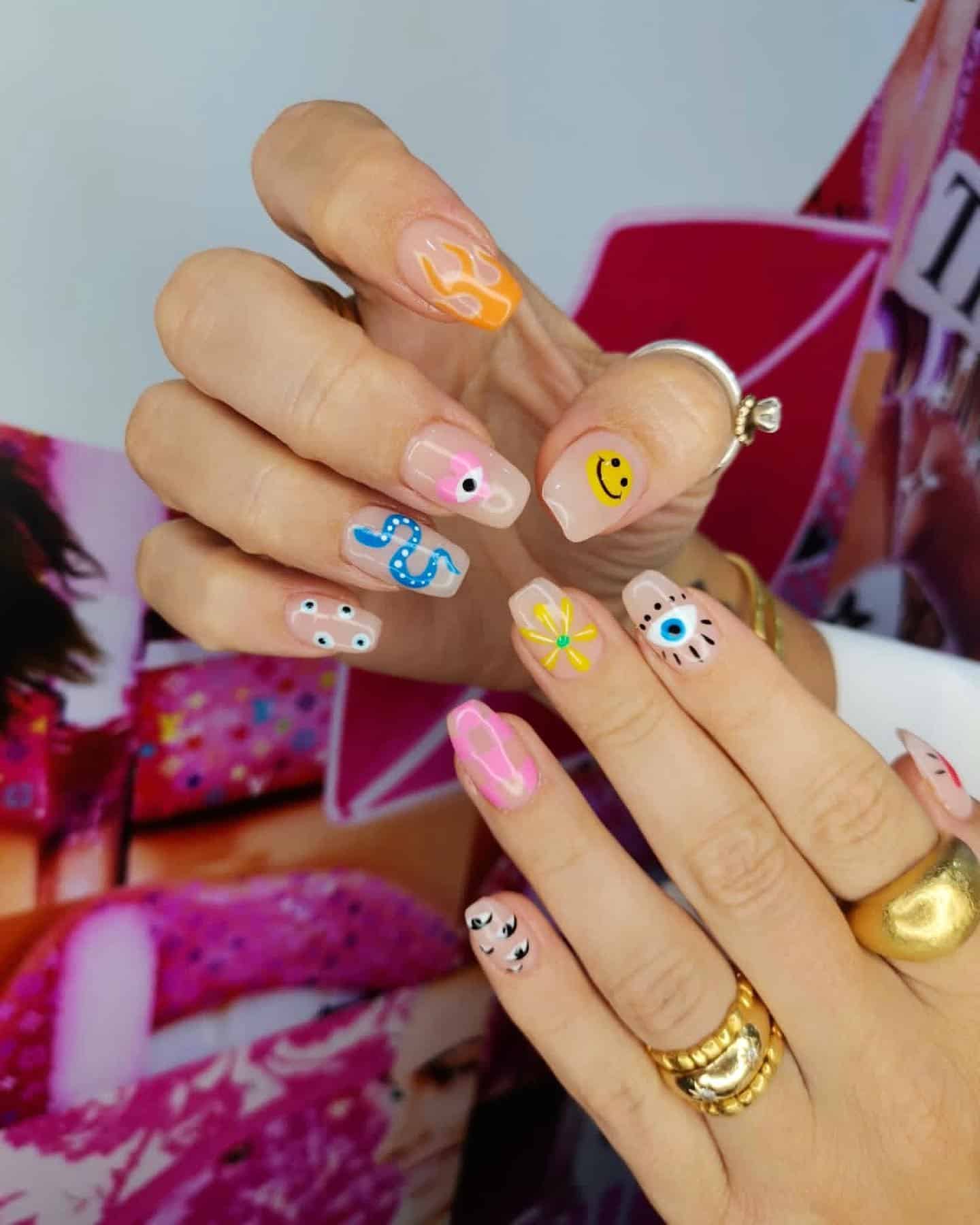 17. Whimsical Pop Icons - insane nail ideas