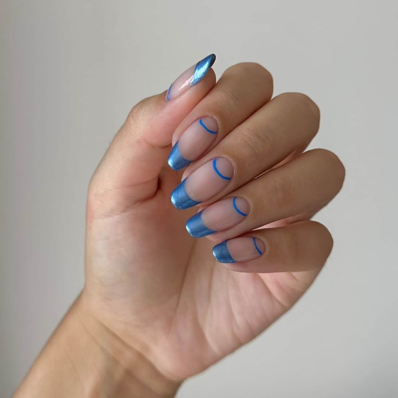 22. Blue Metallic French - insane nail ideas
