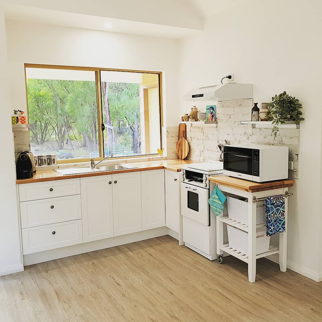 1. Bright White Minimalist Studio Kitchen - studio kitchen ideas