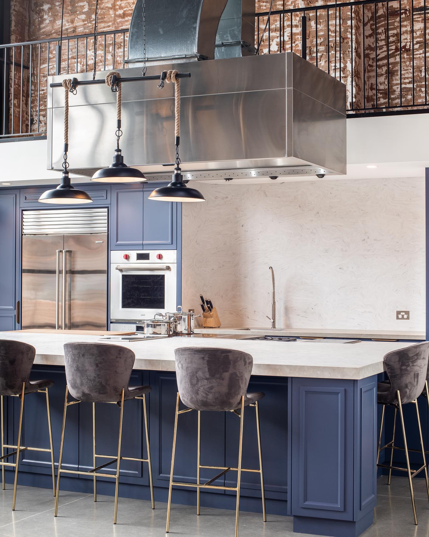 12. Blue and Brass Loft Studio Kitchen - studio kitchen ideas