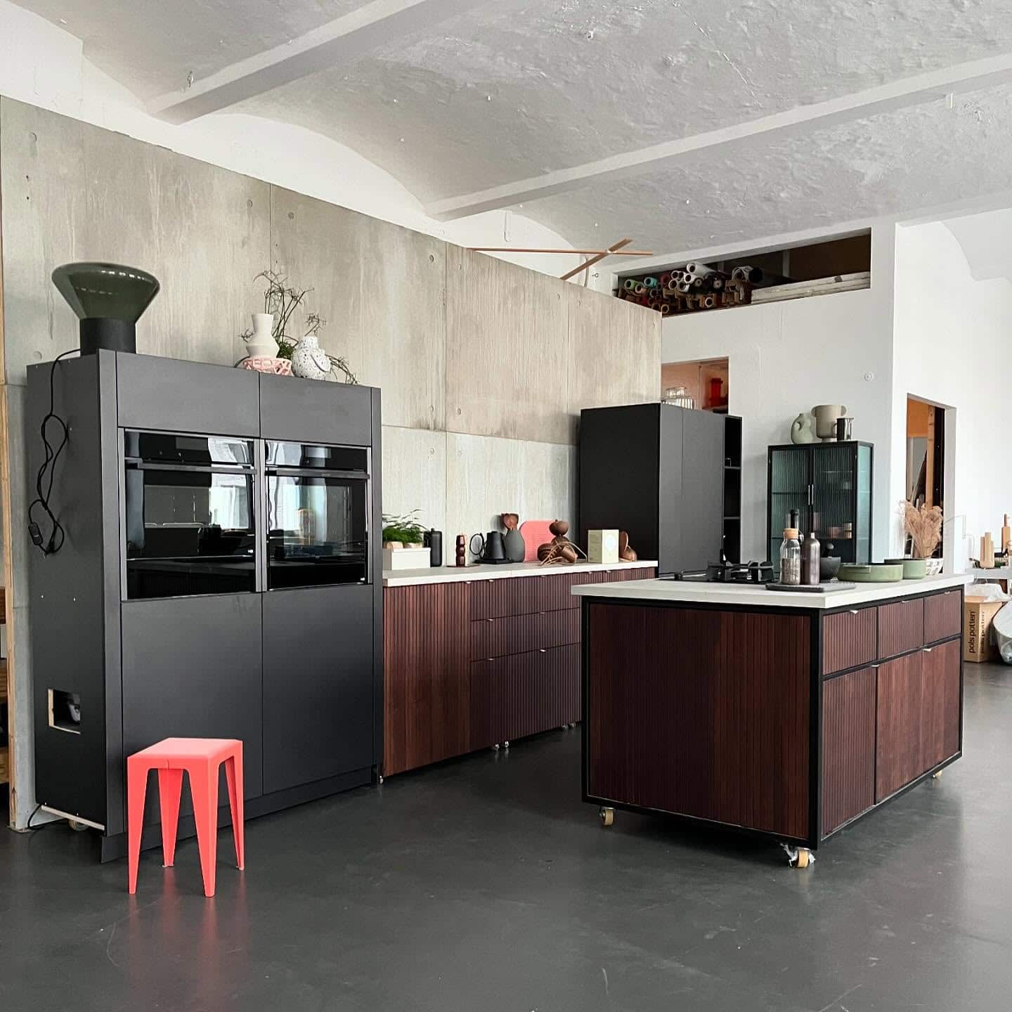 15. Contemporary Dark Wood Studio Kitchen - studio kitchen ideas