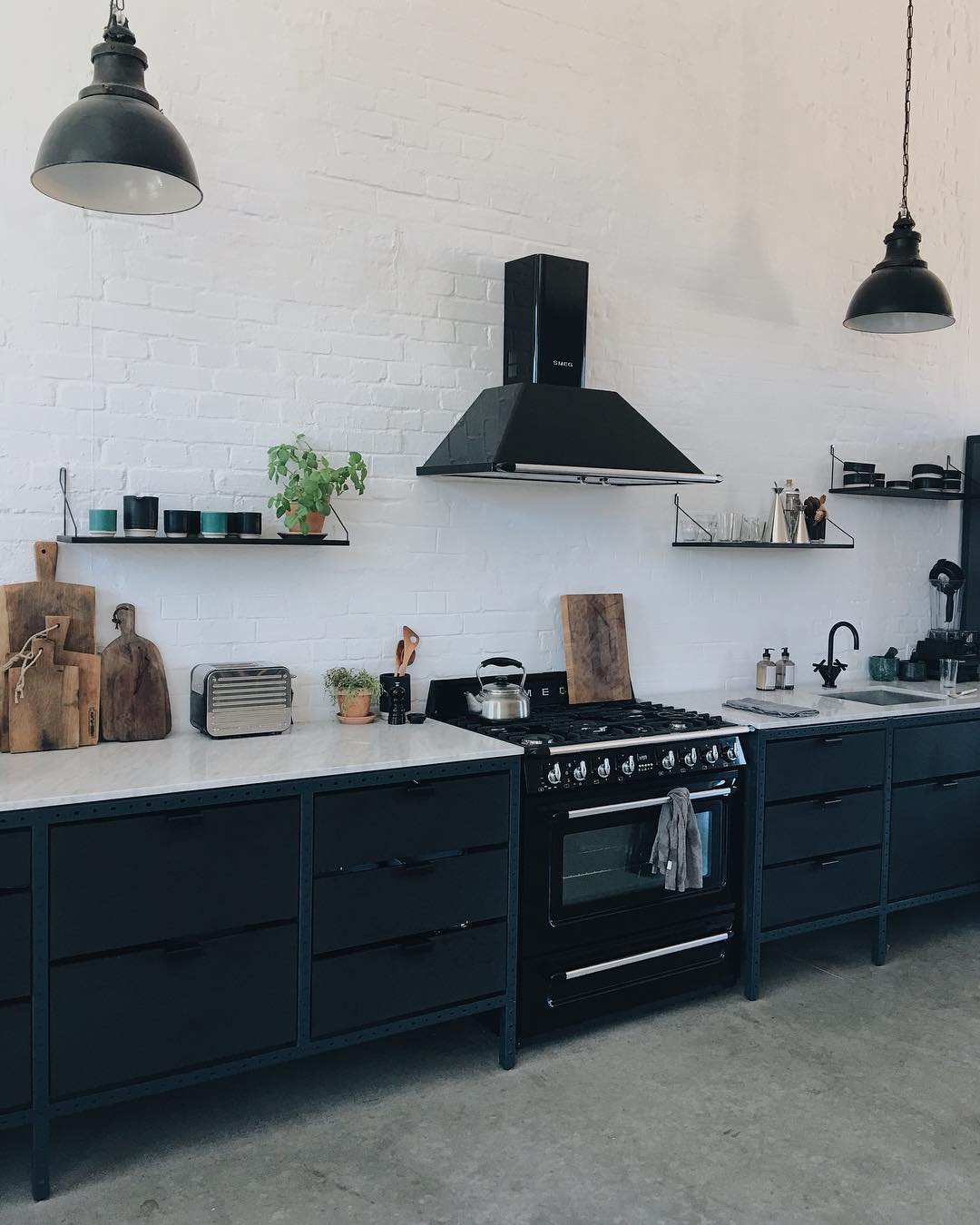 19. Monochrome Studio Kitchen with Industrial Edge - studio kitchen ideas