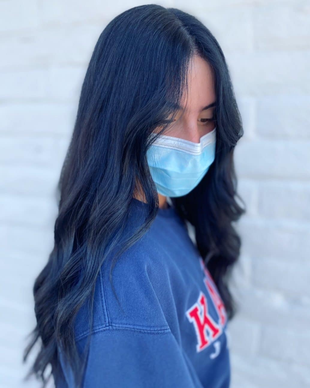 1. Midnight Waves with Subtle Shine - Blue Black Hair Color