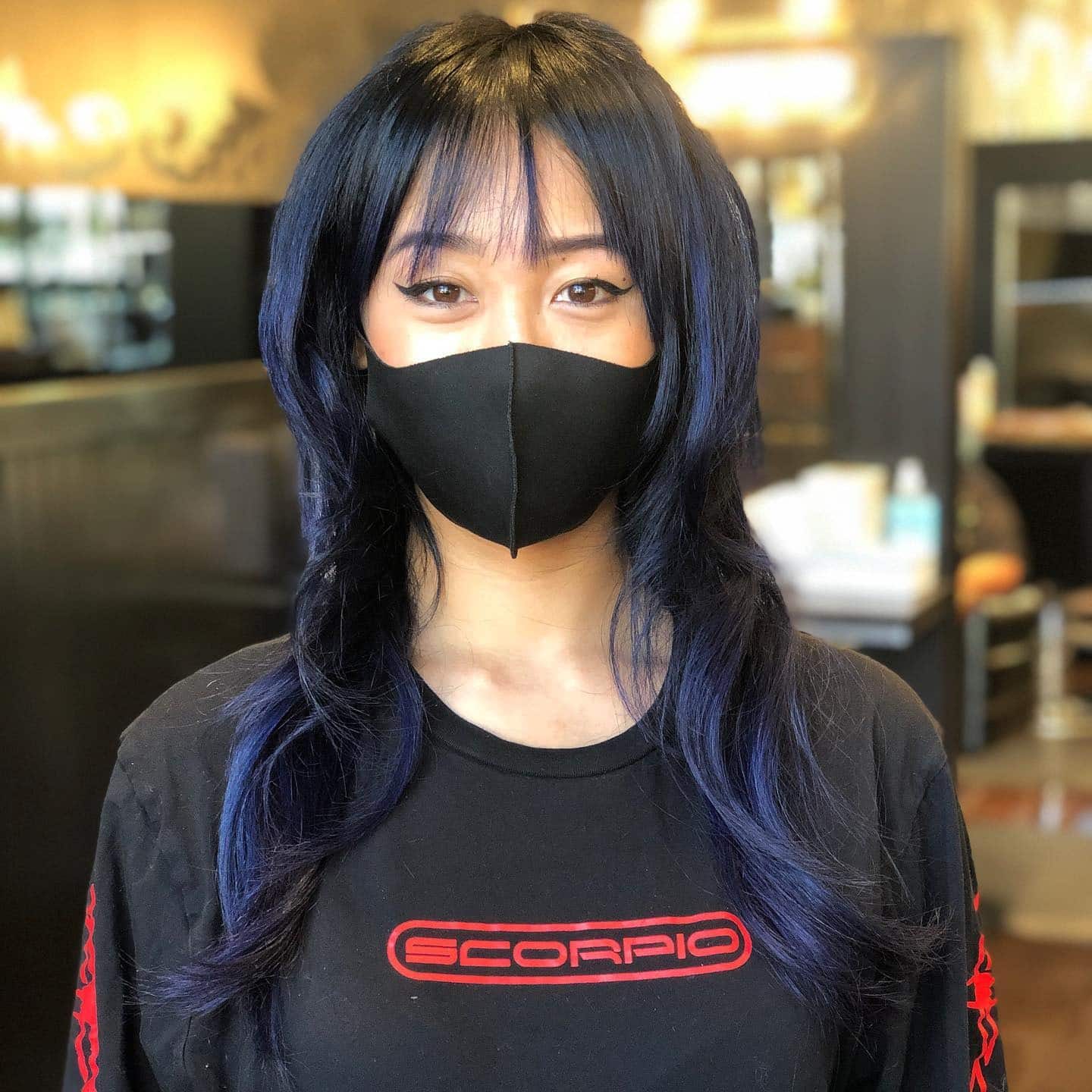 6. Blue-Black with Face-Framing Bangs - Blue Black Hair Color