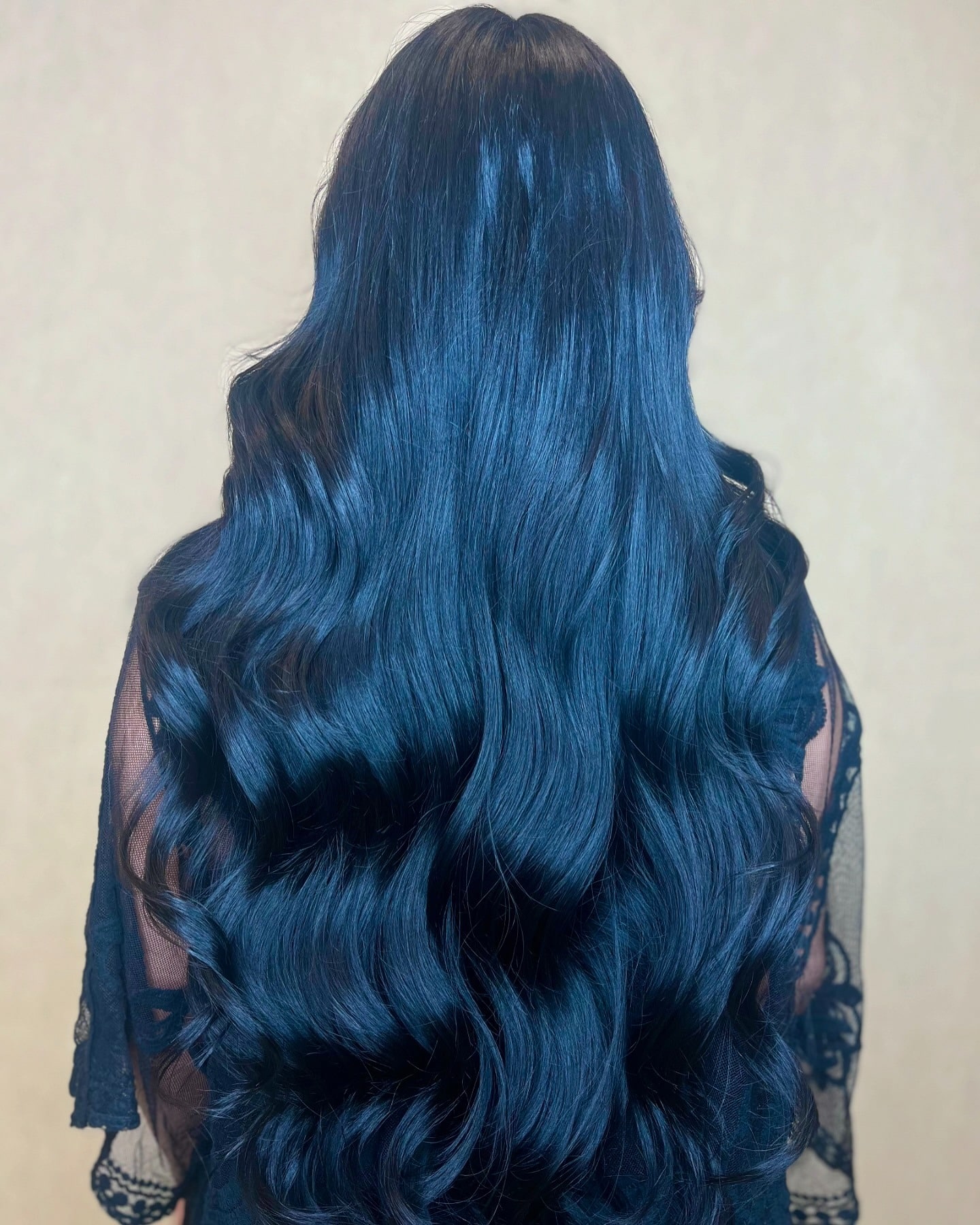 21. Voluminous Blue-Black Glam Waves - Blue Black Hair Color
