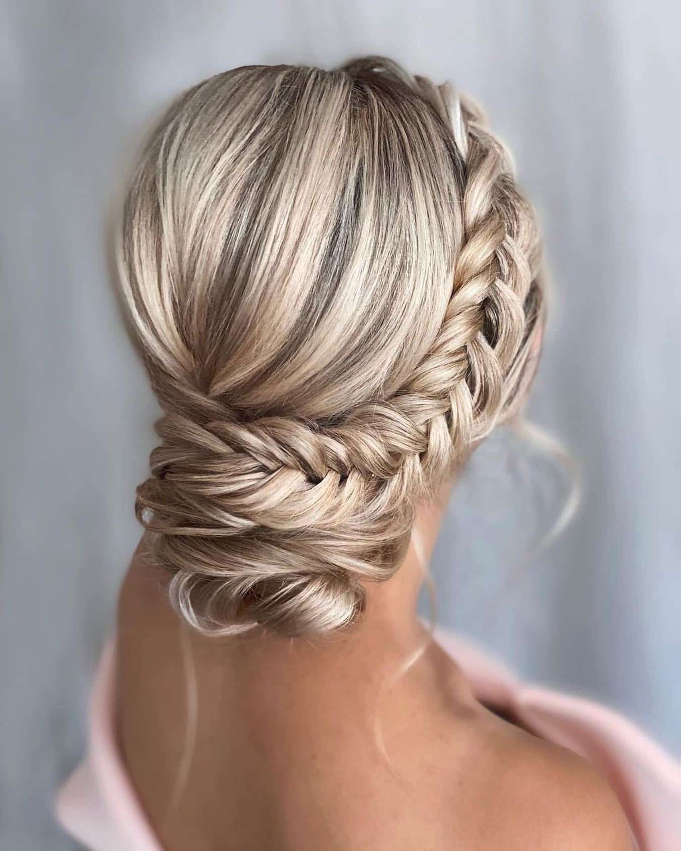 16. Braided Low Bun in Cool Blonde - Twist Braid Hairstyles