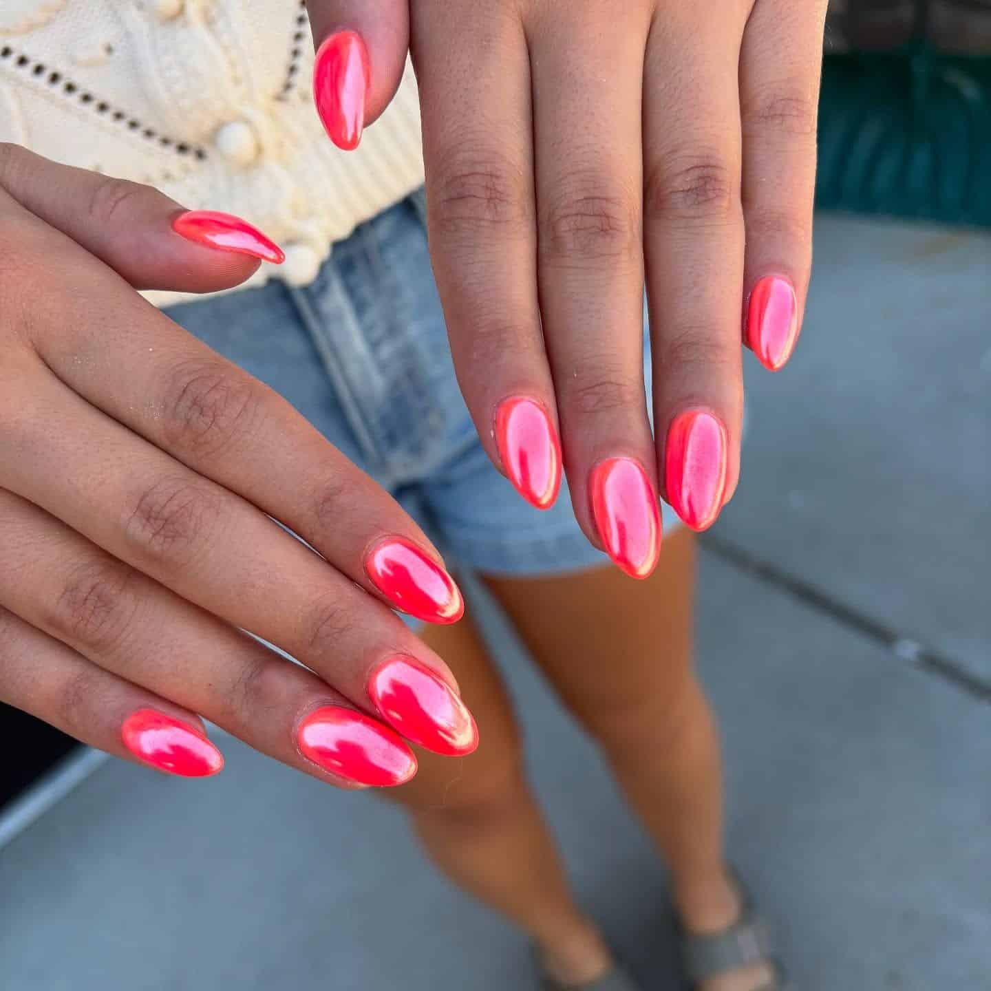 21. Neon Coral Chrome Almond Nails - june nail ideas