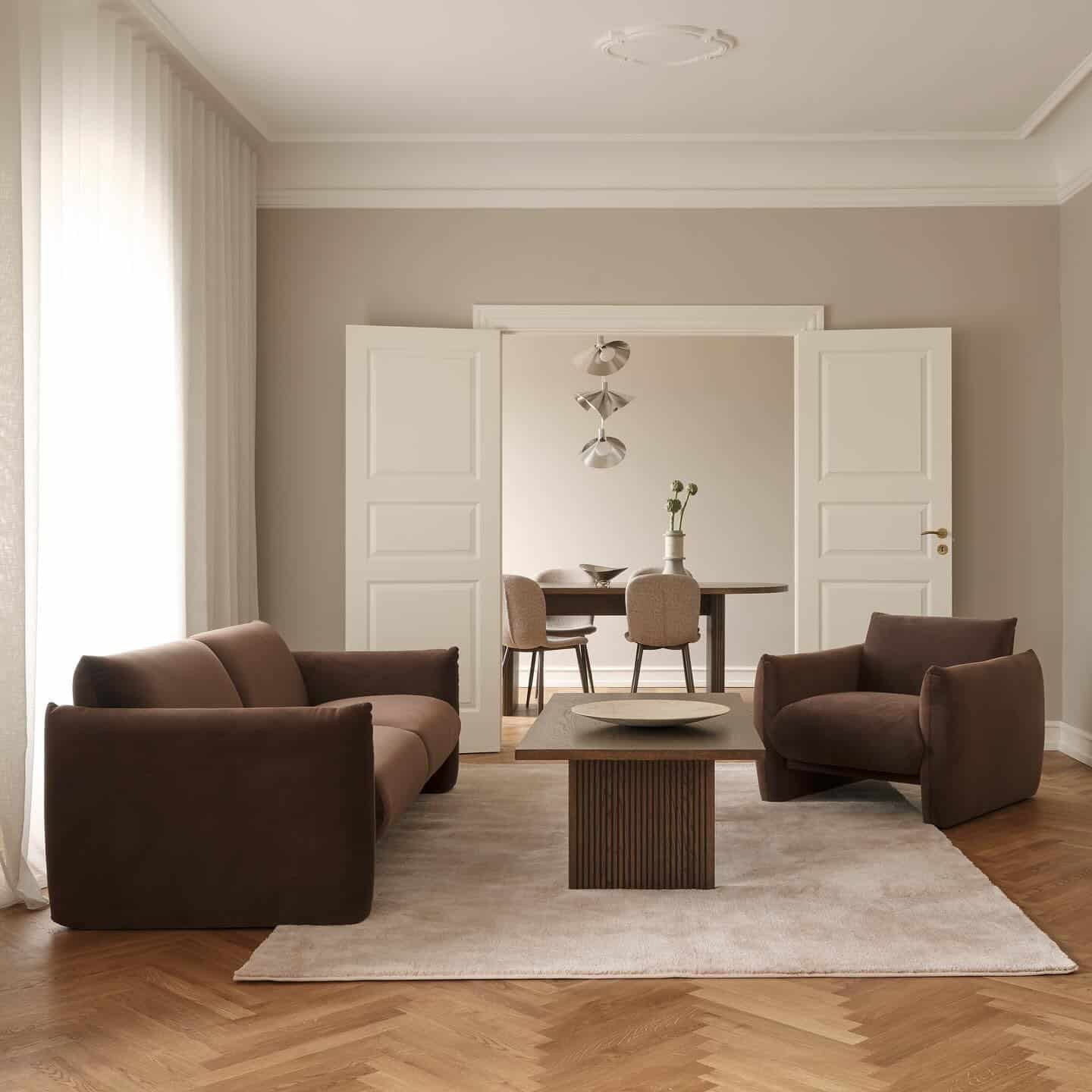 1. Modern Minimalism with Chocolate Accents - light brown sofa living room ideas