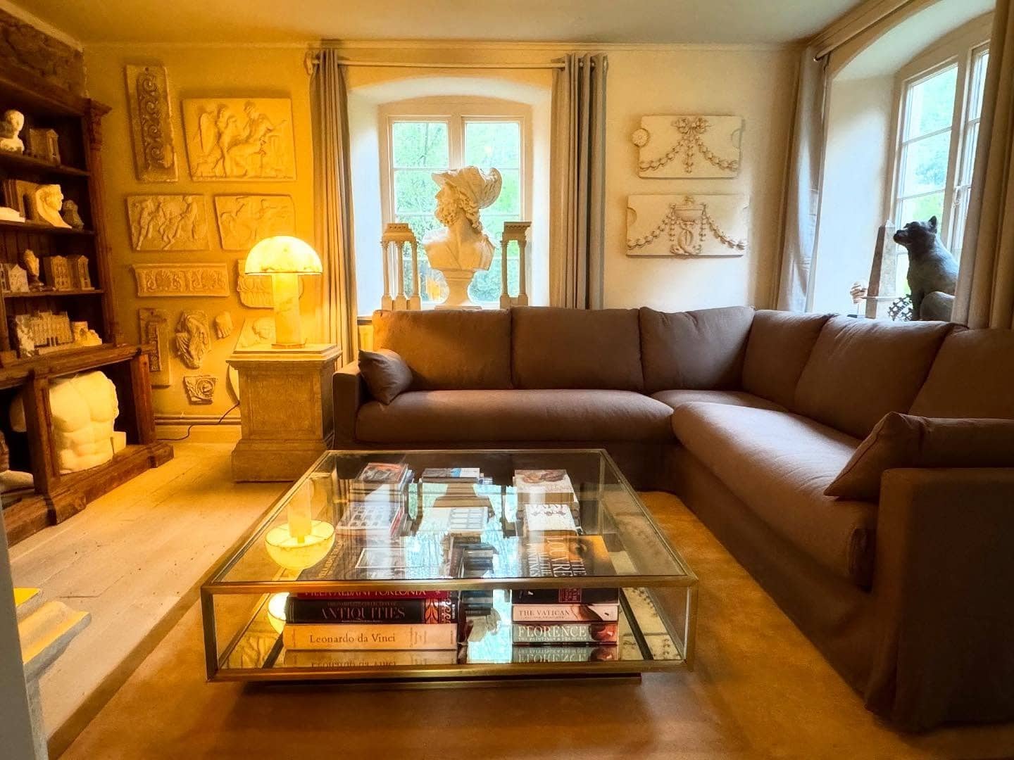 3. Art Collector’s Retreat - light brown sofa living room ideas