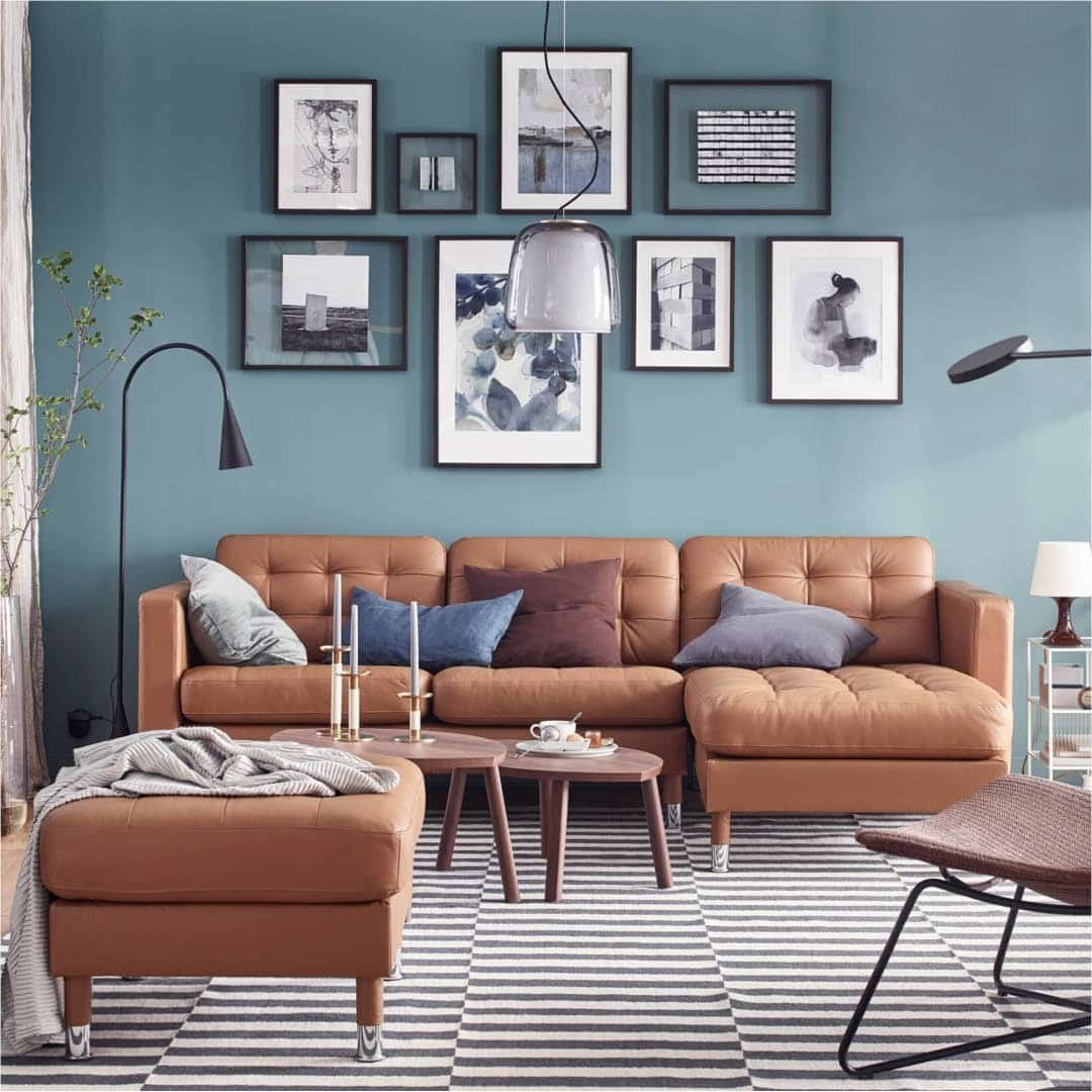 17. Graphic Contrast with Mid-Tone Leather - light brown sofa living room ideas