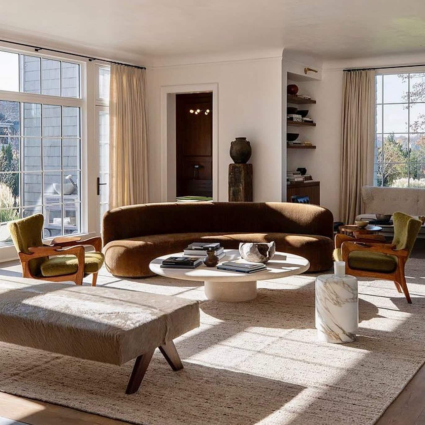 21. Mid-Century Elegance with Earthy Browns - light brown sofa living room ideas