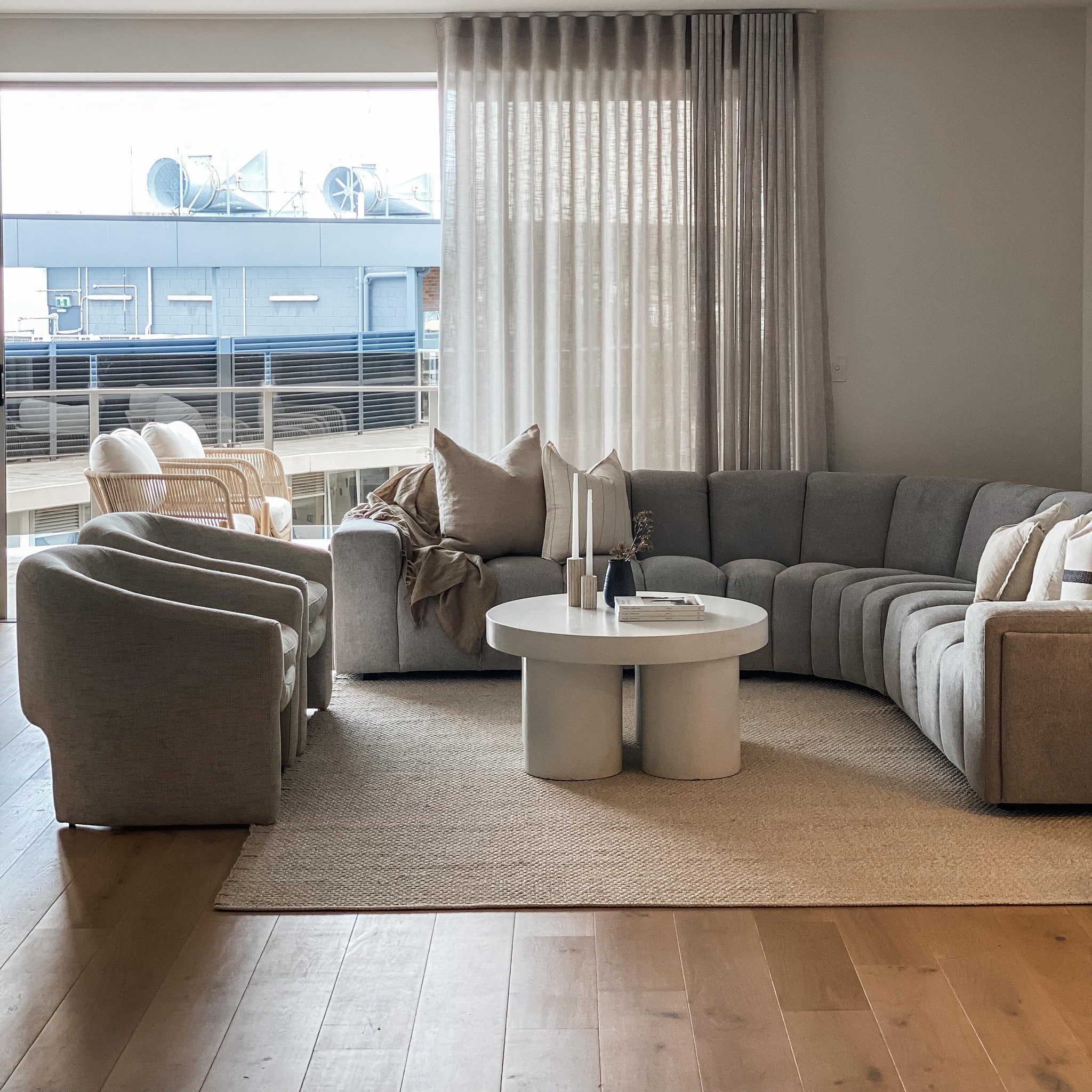 6. Soft Curves in Gray - contemporary small living room ideas