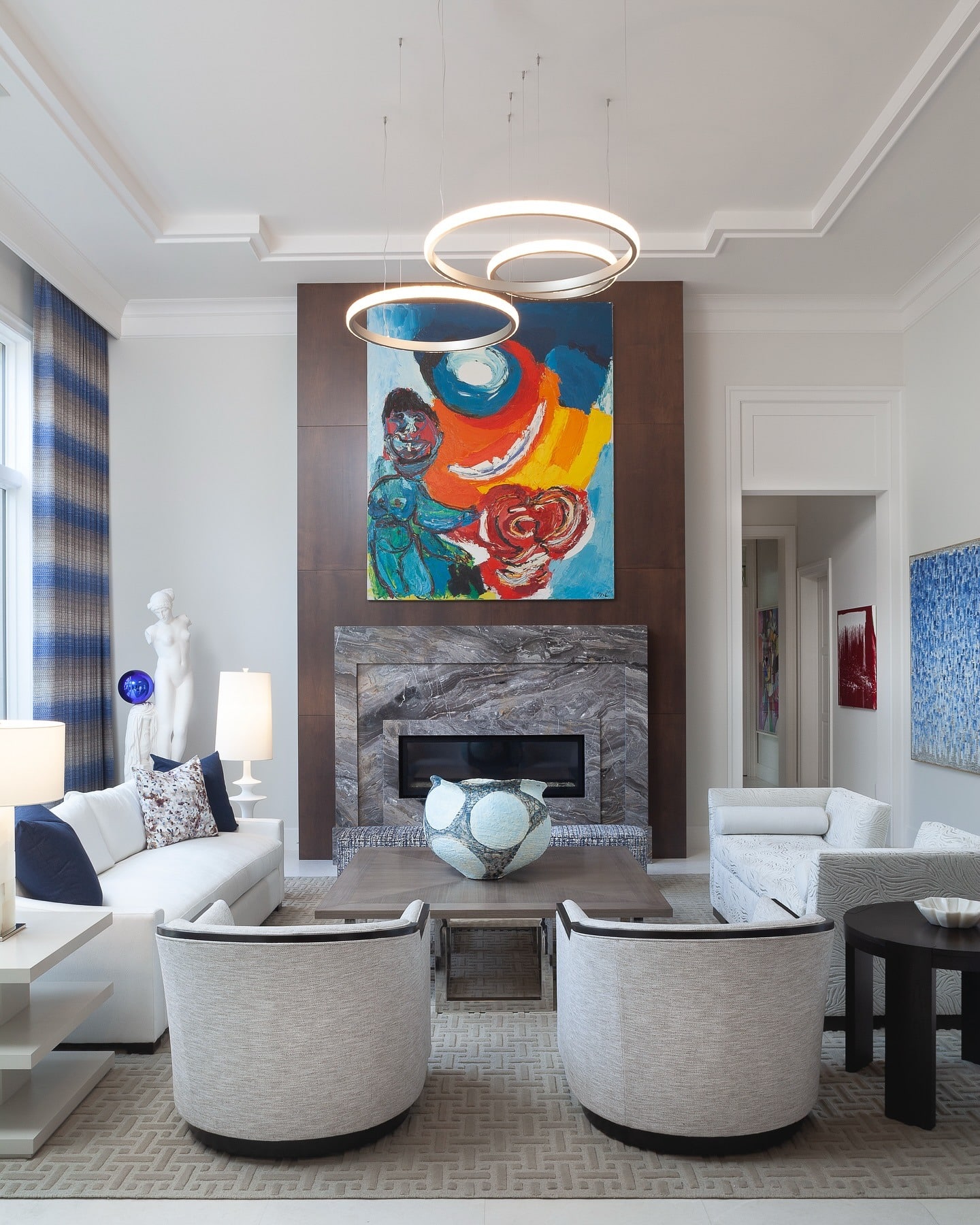 11. Artistic Energy with Bold Accents - contemporary small living room ideas