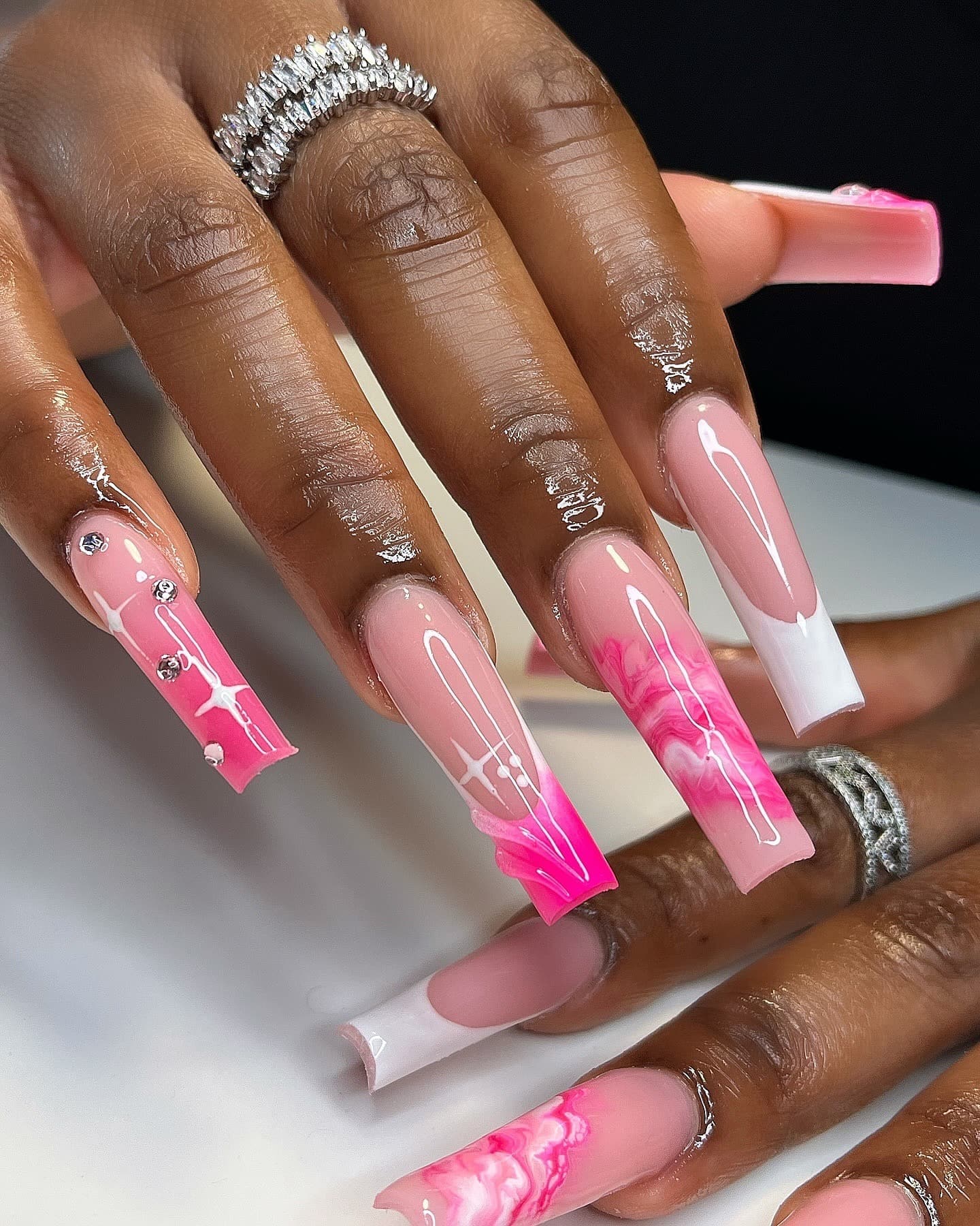 1. Glossy Pink Cross Nails with Crystal Accents - nail ideas for birthday