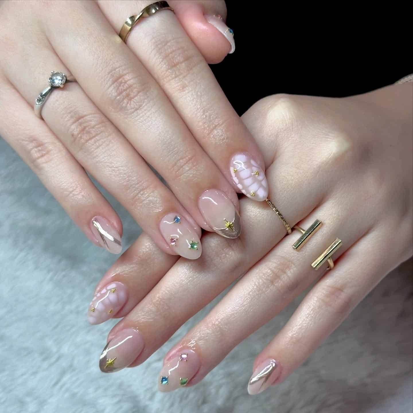 19. Pastel Shimmer Nails with Crystal Accents - nail ideas for birthday