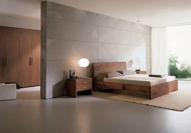 12. Minimalist Concrete and Warm Wood Contrast - large bedroom ideas