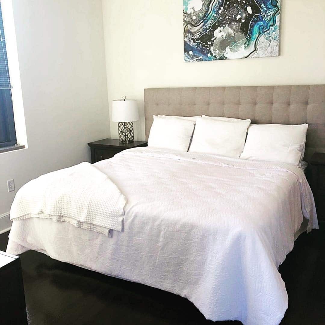 15. Simple Contemporary with Monochrome Touches - large bedroom ideas