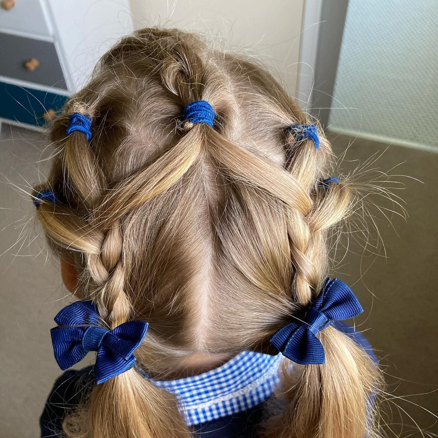 3. Crisscross Braids with Low Pigtails on Blonde Hair - Hairstyles For School