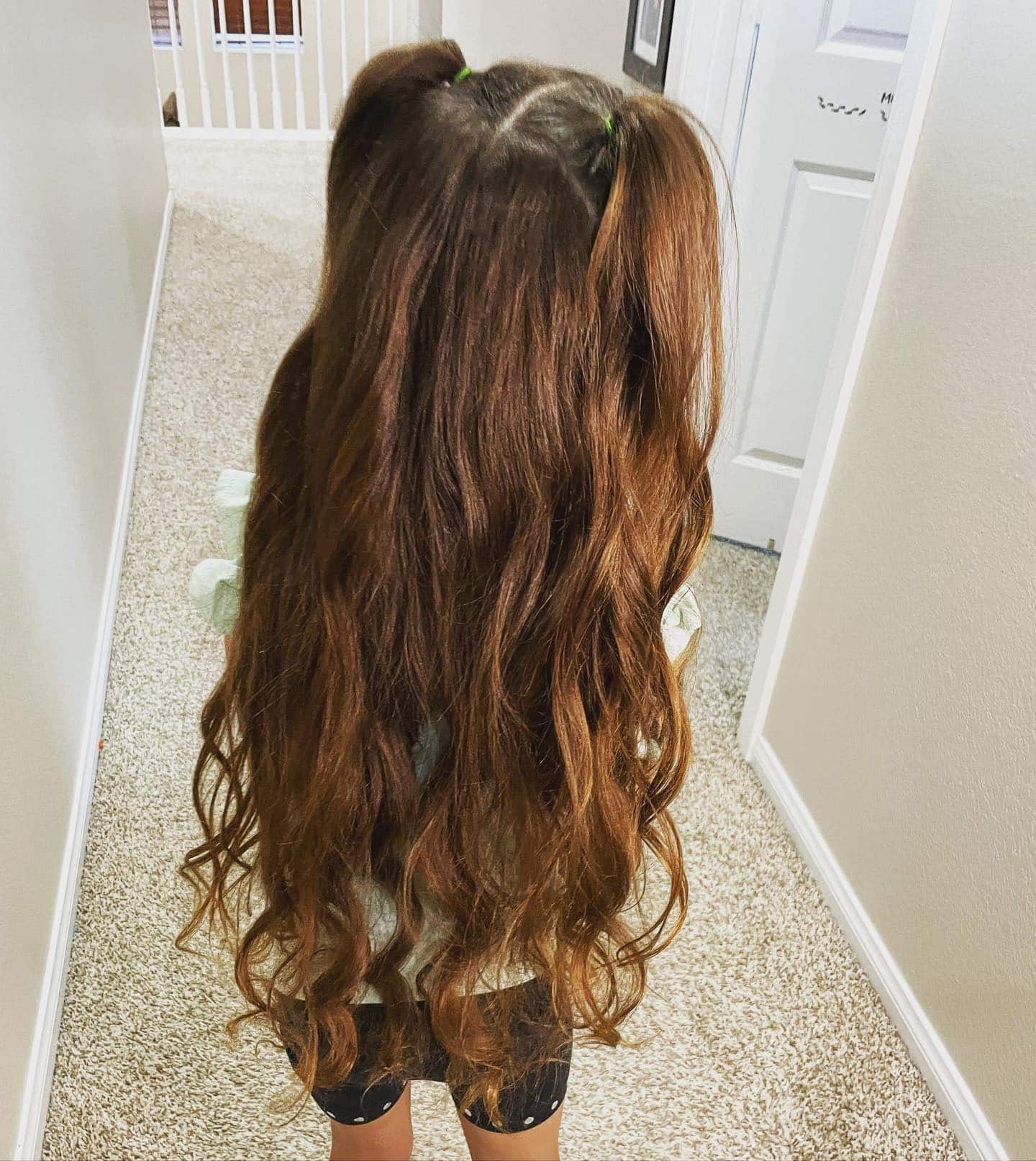 4. Loose Twin Ponytails on Long Auburn Hair - Hairstyles For School