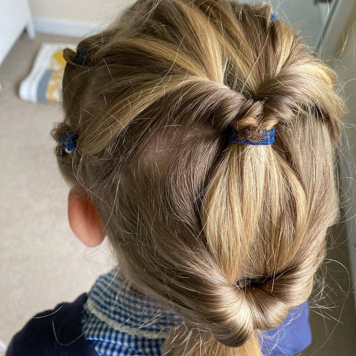 8. Tied-Back Ponytail Loops on Blonde Hair - Hairstyles For School