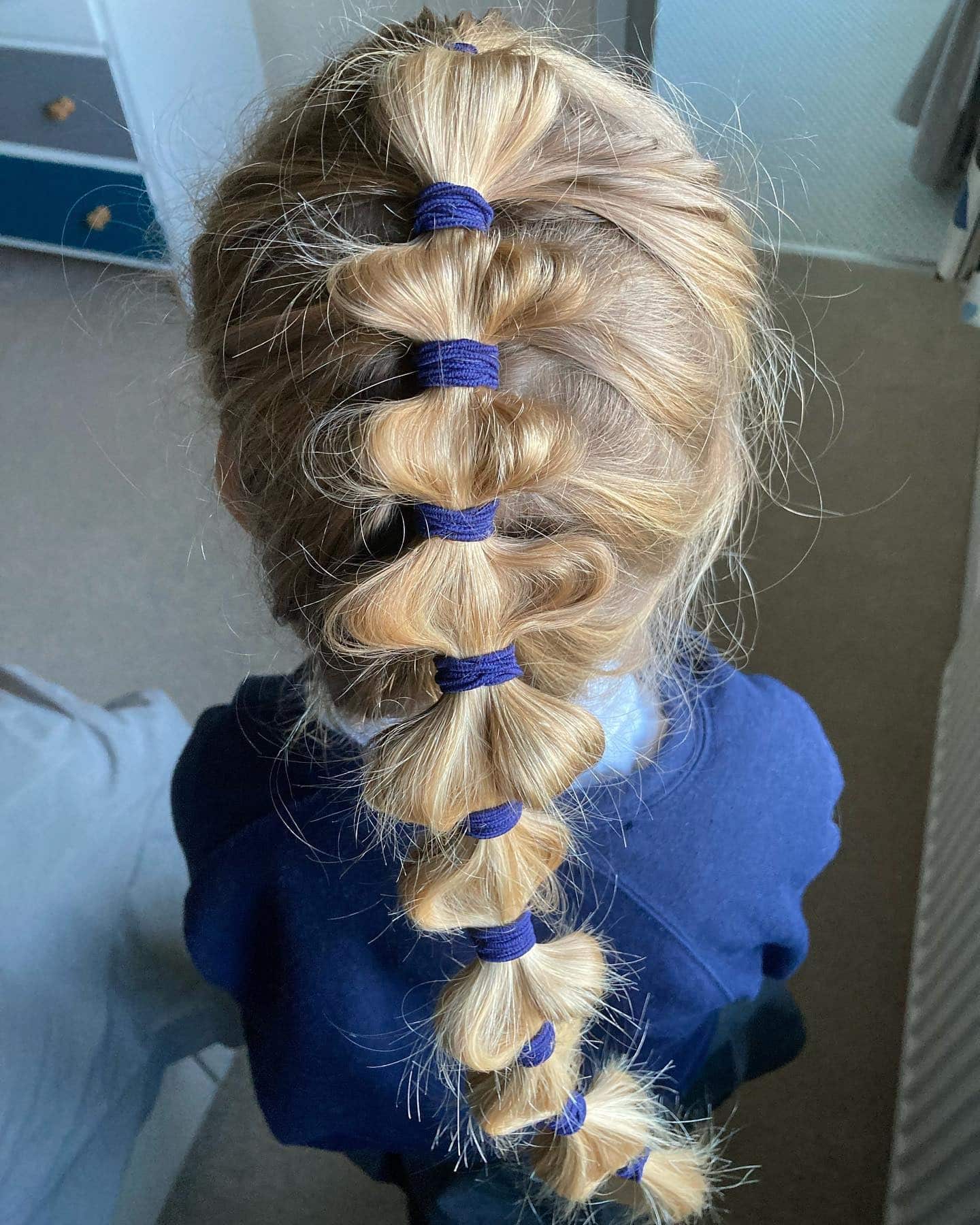 9. Bubble Ponytail with Navy Elastics on Blonde Hair - Hairstyles For School