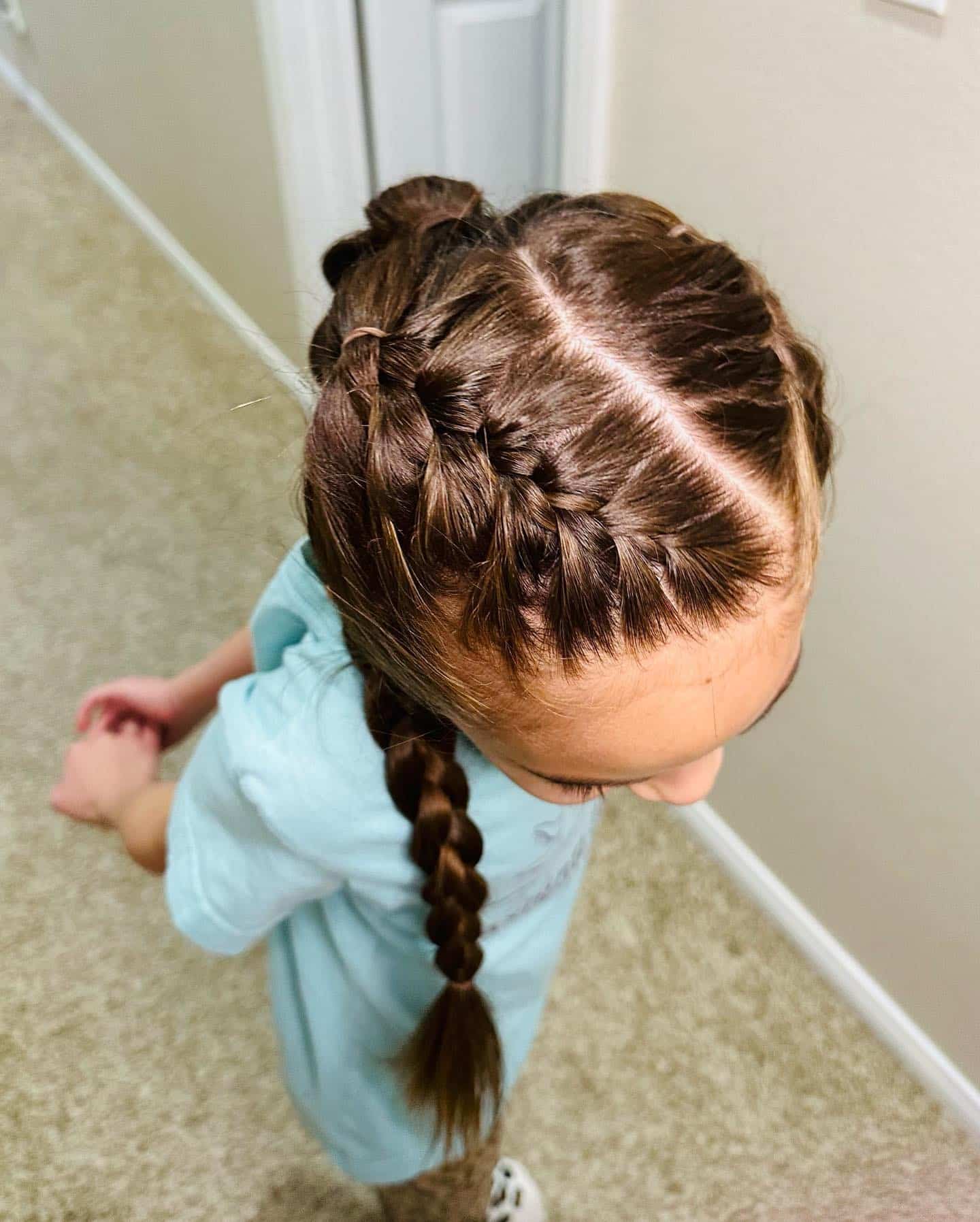 10. Dutch Braids into Low Ponytails on Brown Hair - Hairstyles For School