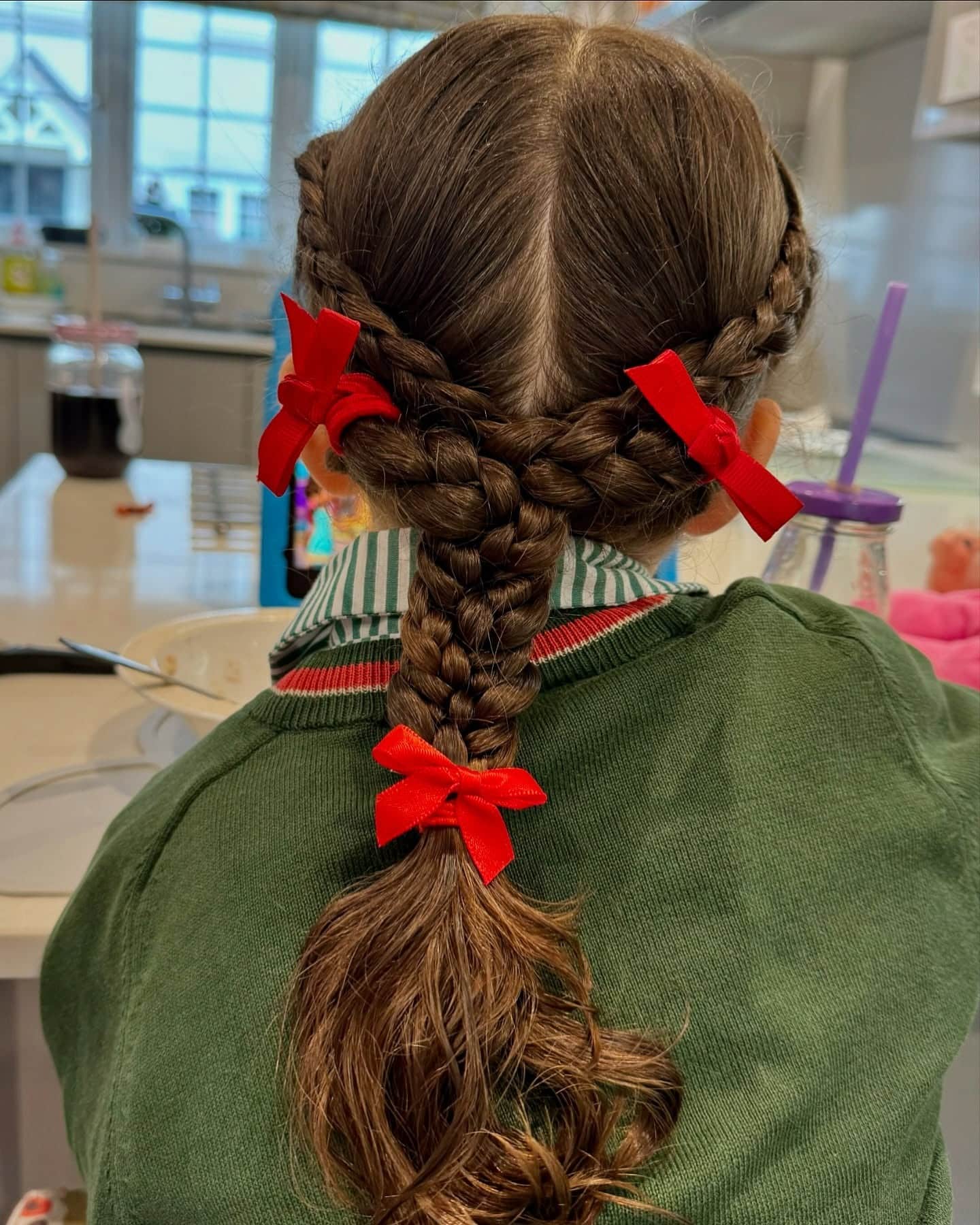 11. Double Braided Crossover with Red Ribbons on Brown Hair - Hairstyles For School