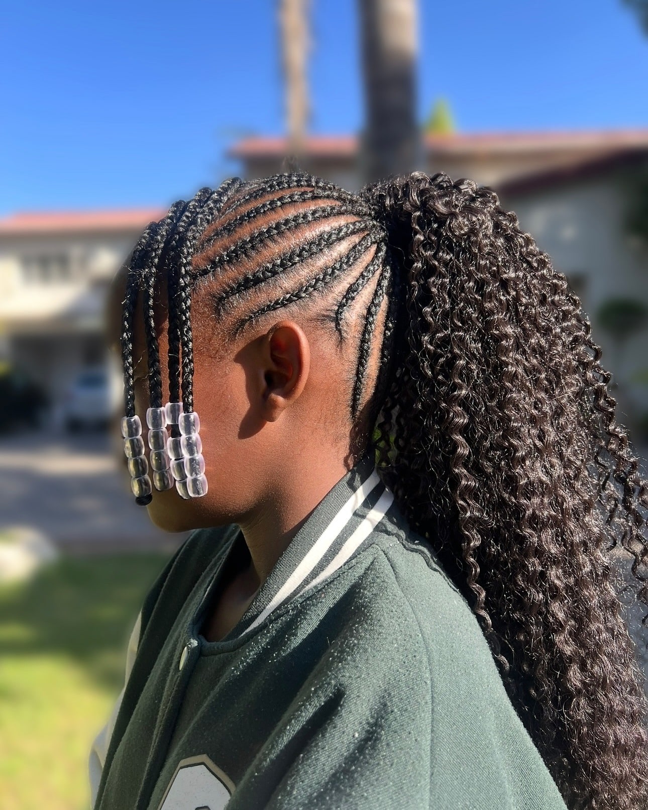 19. Cornrow Ponytail with Beaded Ends on Black Hair - Hairstyles For School