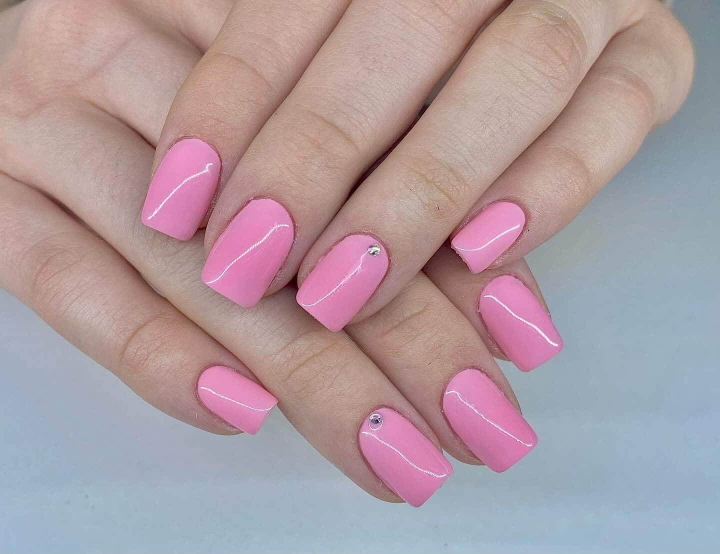 1. Glossy Baby Pink Square Nails with Accent Gem - neon pink nail ideas