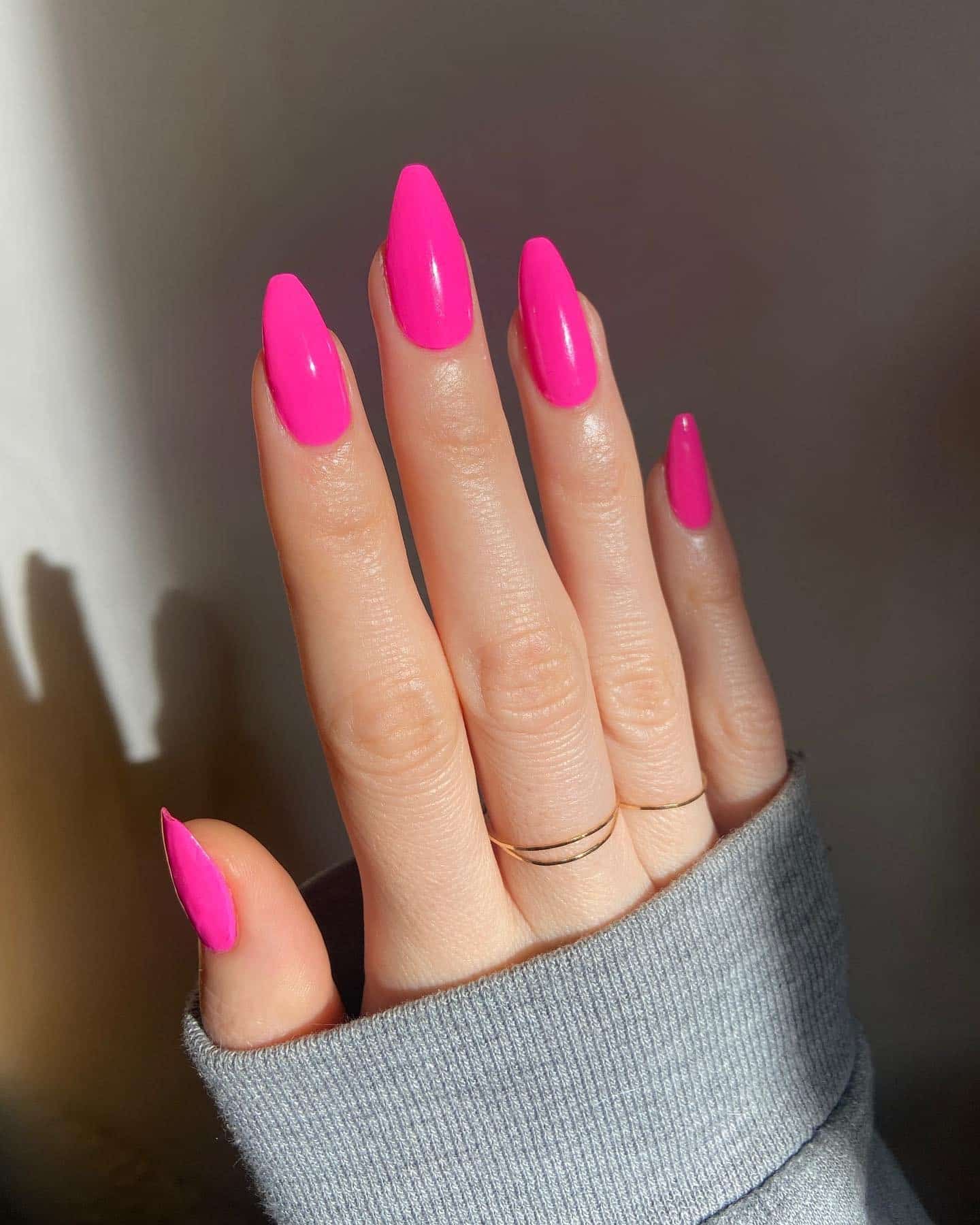 2. Neon Pink Almond Nails with High Shine - neon pink nail ideas