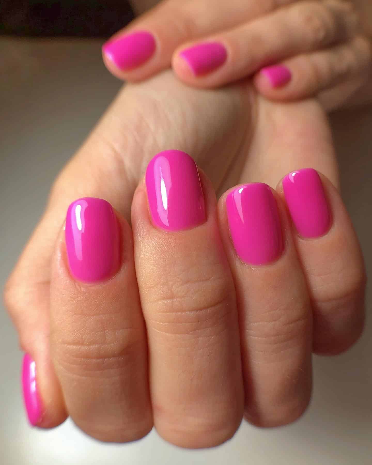 5. Glossy Fuchsia Pink Ovals - neon pink nail ideas