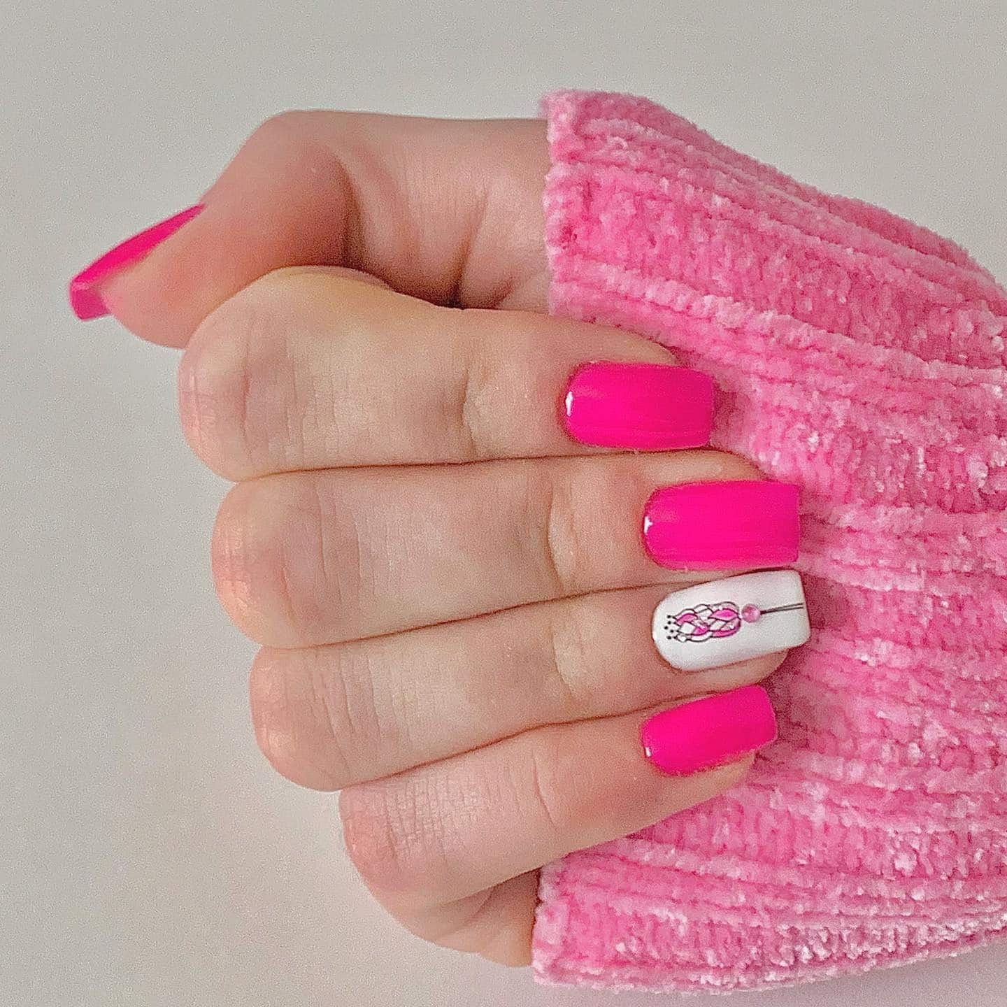 6. Neon Pink with White Accent Art - neon pink nail ideas