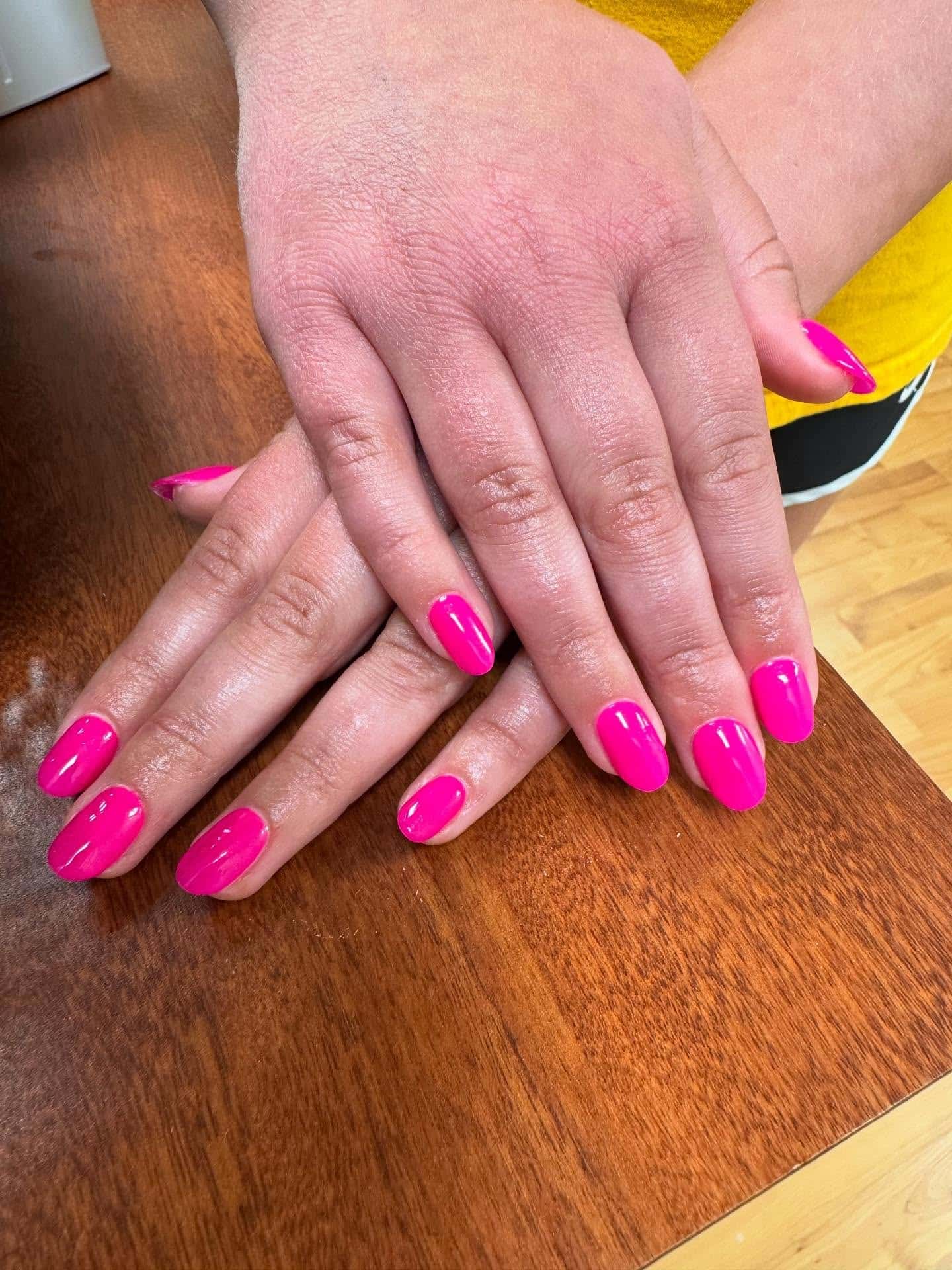 9. Vivid Neon Pink Rounds - neon pink nail ideas