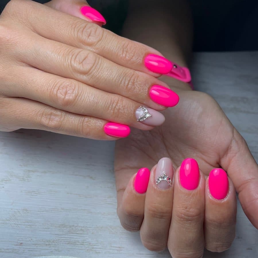 11. Neon Pink with Crystal Accent Almonds - neon pink nail ideas