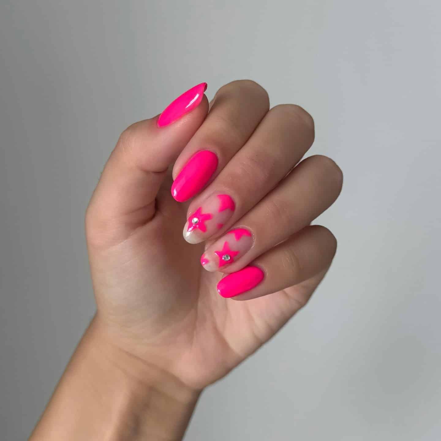 16. Neon Pink with Star Art Accents - neon pink nail ideas