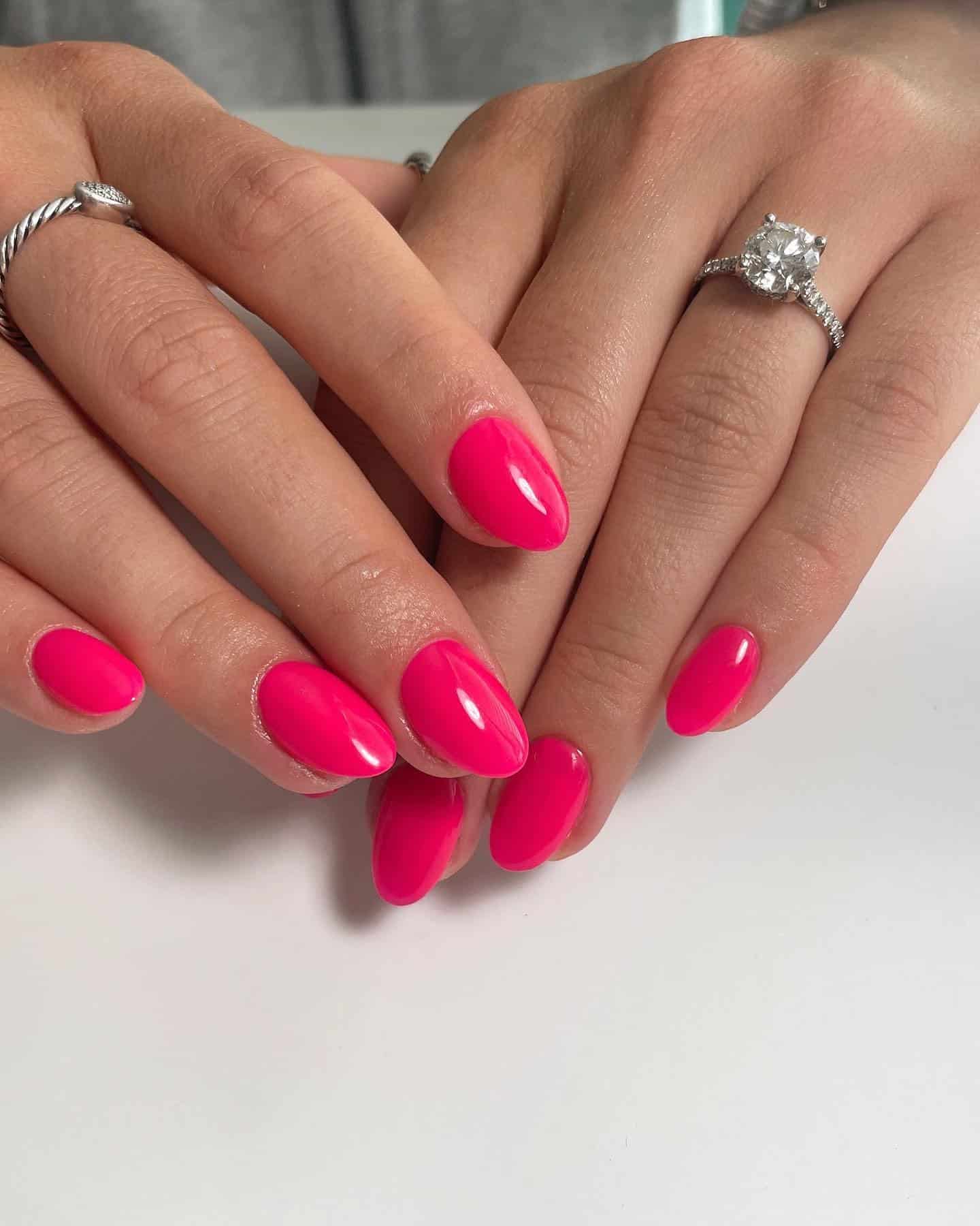 18. Elegant Neon Pink Almond Nails - neon pink nail ideas