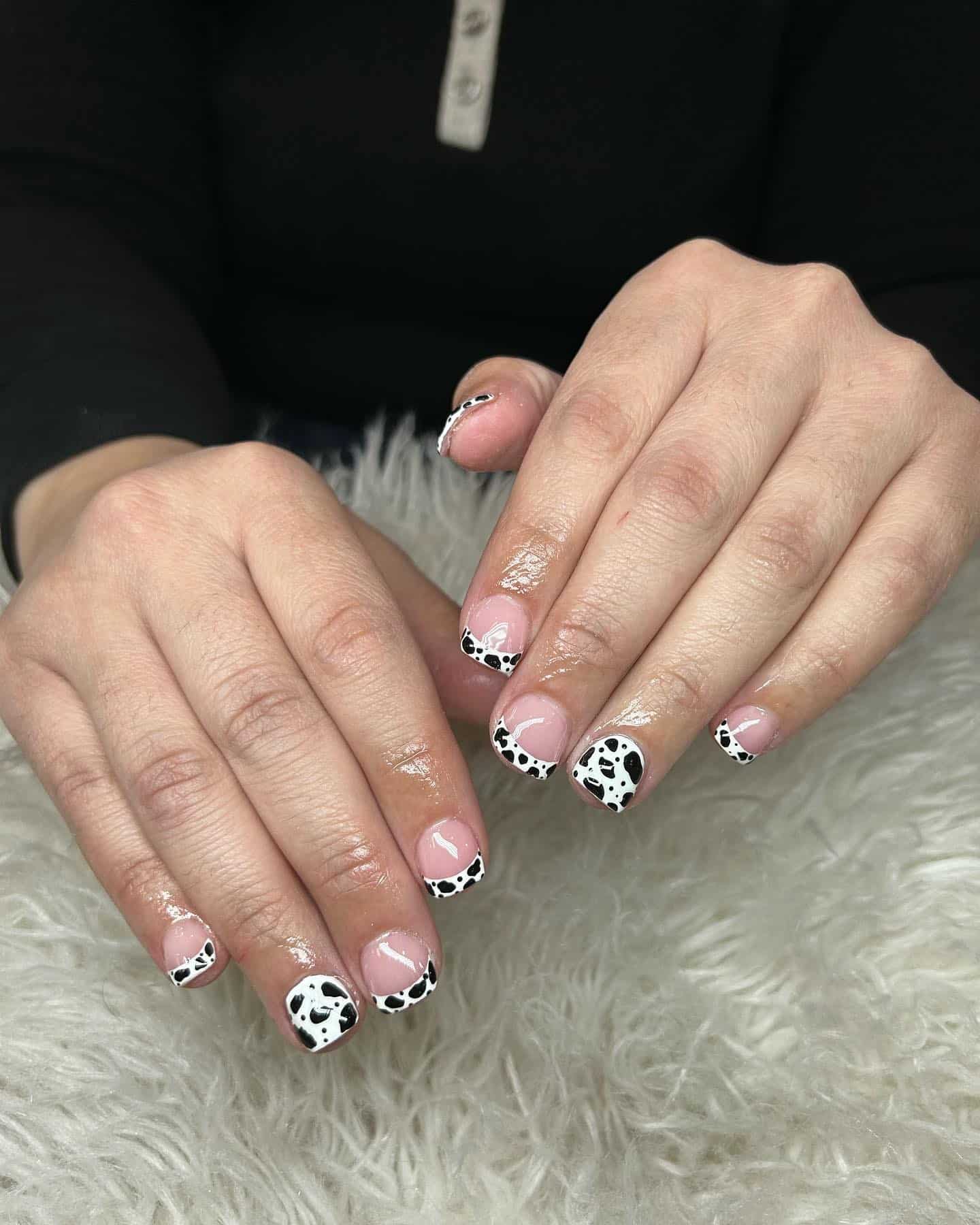 1. Cow Print French Tips - overlay nail ideas