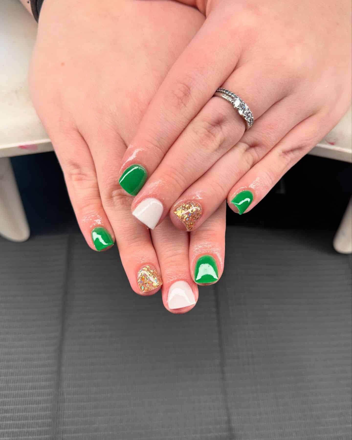 4. Emerald and Gold Statement Nails - overlay nail ideas