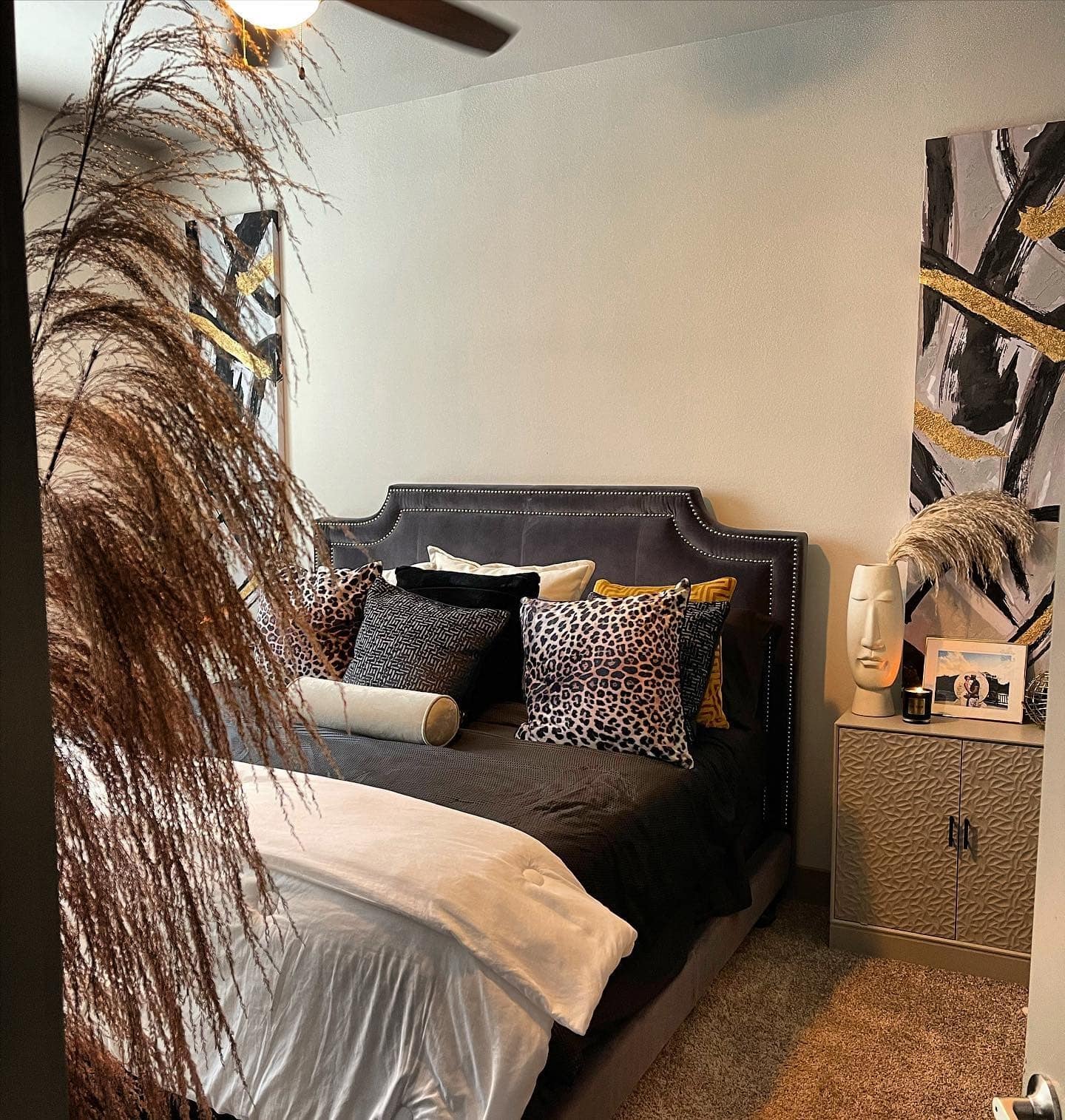 2. Bold Personality with Luxe Layers - black and gold bedroom ideas