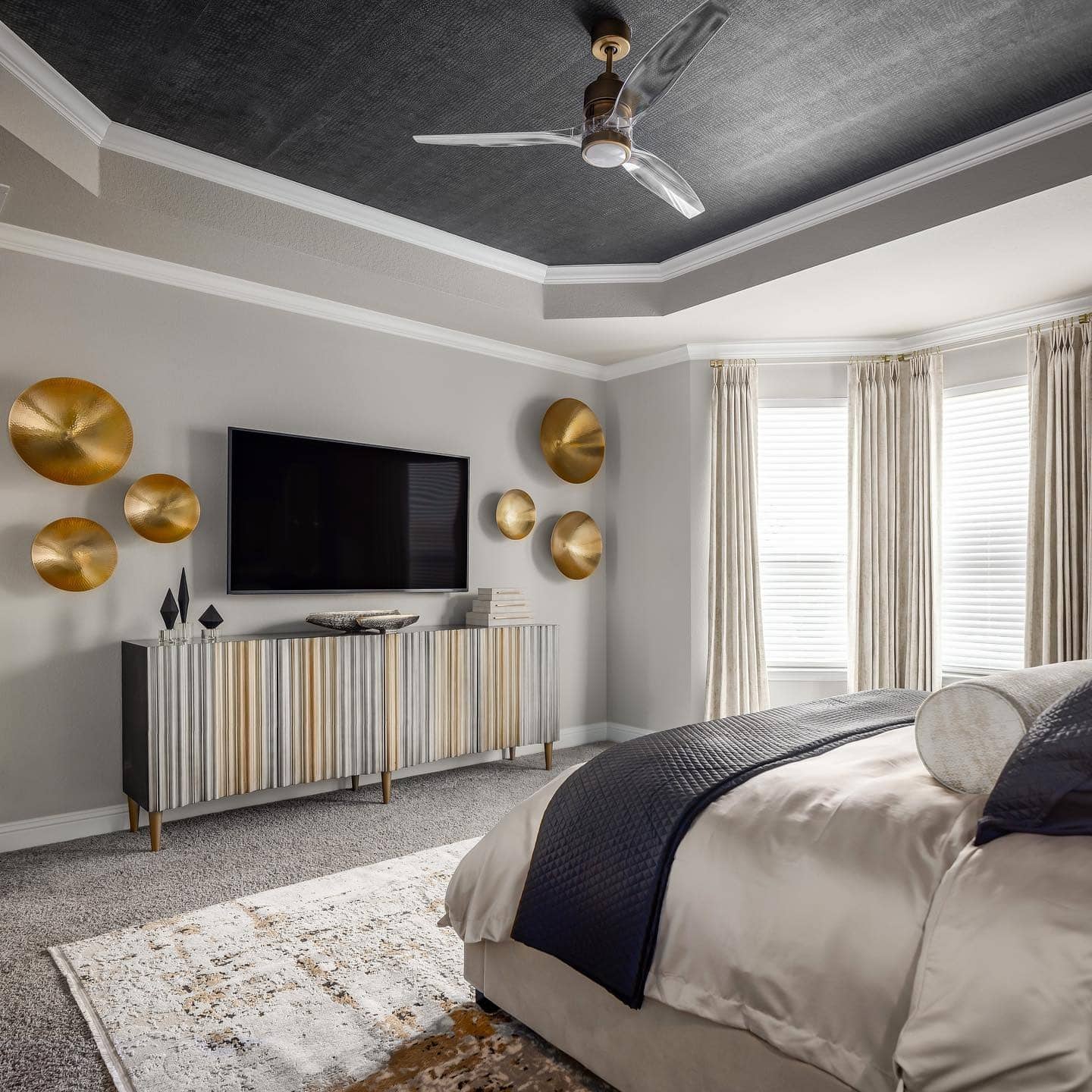 4. Sophisticated Contrast with Metallic Accents - black and gold bedroom ideas