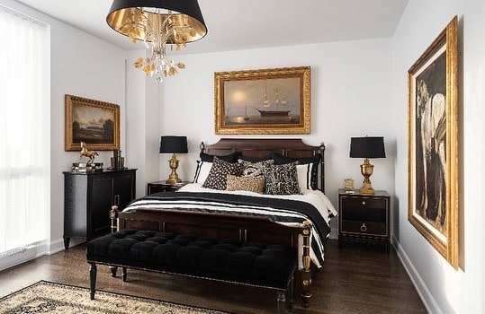 9. Traditional Opulence with Black and Gold Harmony - black and gold bedroom ideas