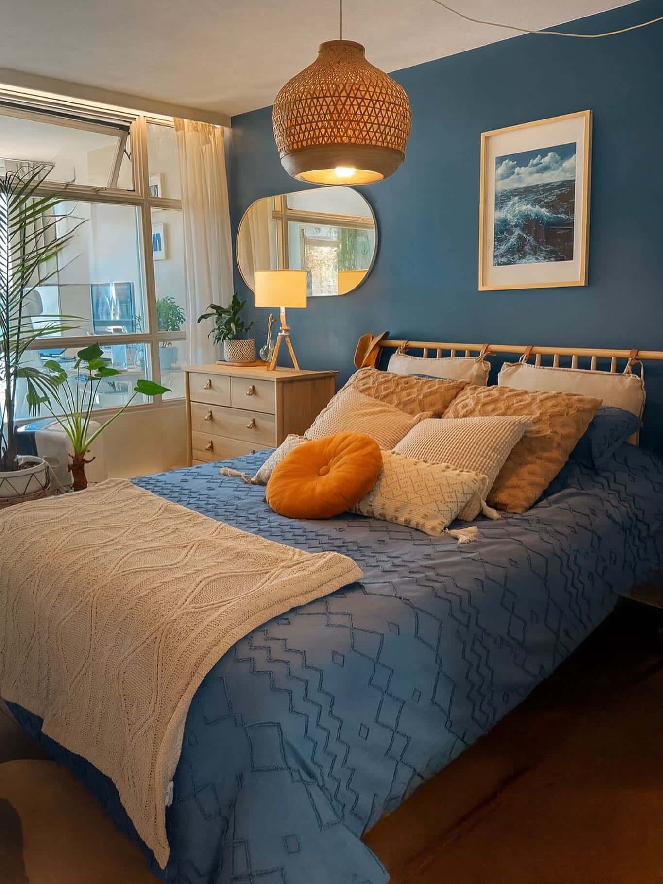 1. Coastal Comfort with Natural Accents - navy blue and grey bedroom ideas