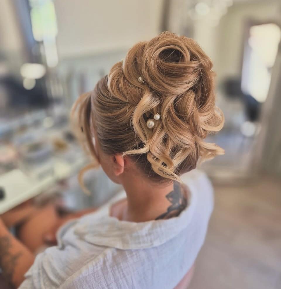 3. Voluminous Blonde Curl Updo with Pearl Details - Wedding Hairstyles