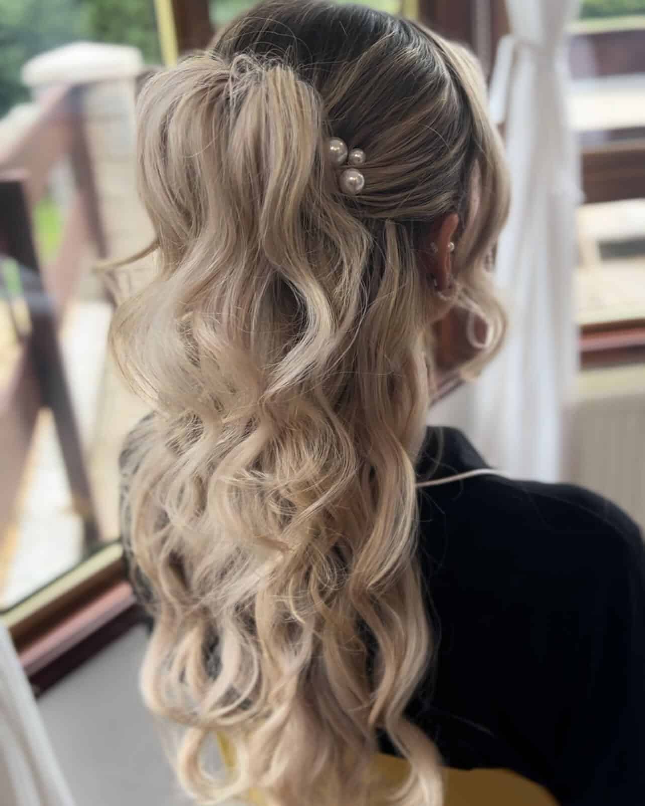 6. Blonde Half-Up Waves with Pearl Pins - Wedding Hairstyles